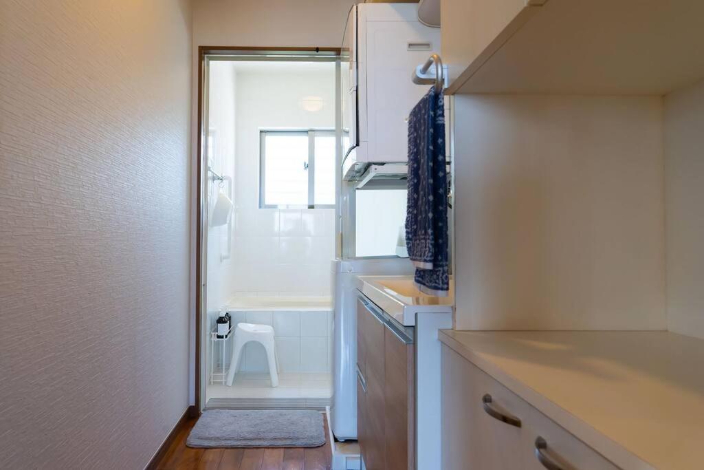 Two-Bedroom Apartment - Photo 32