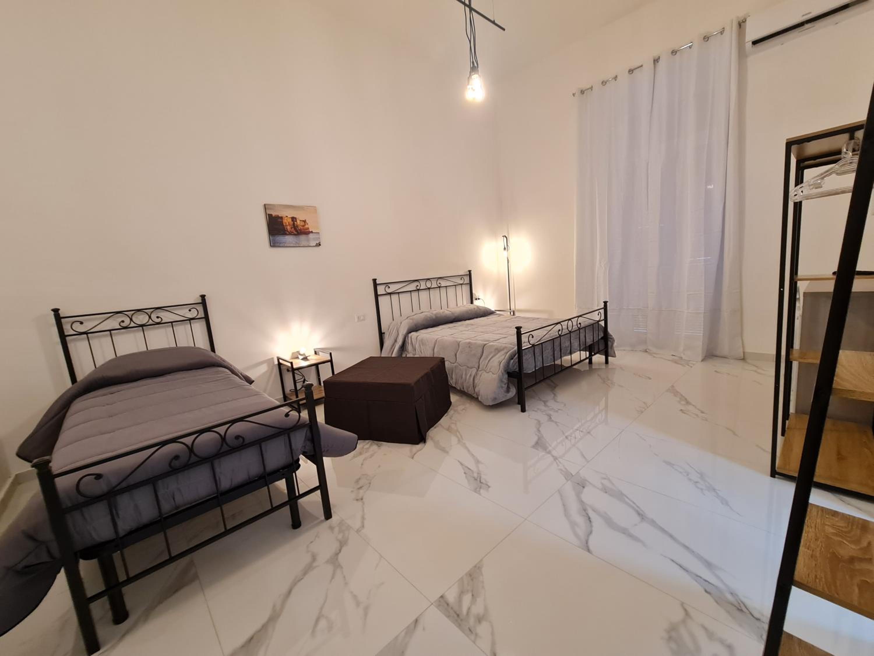 Quadruple Room with Private Bathroom