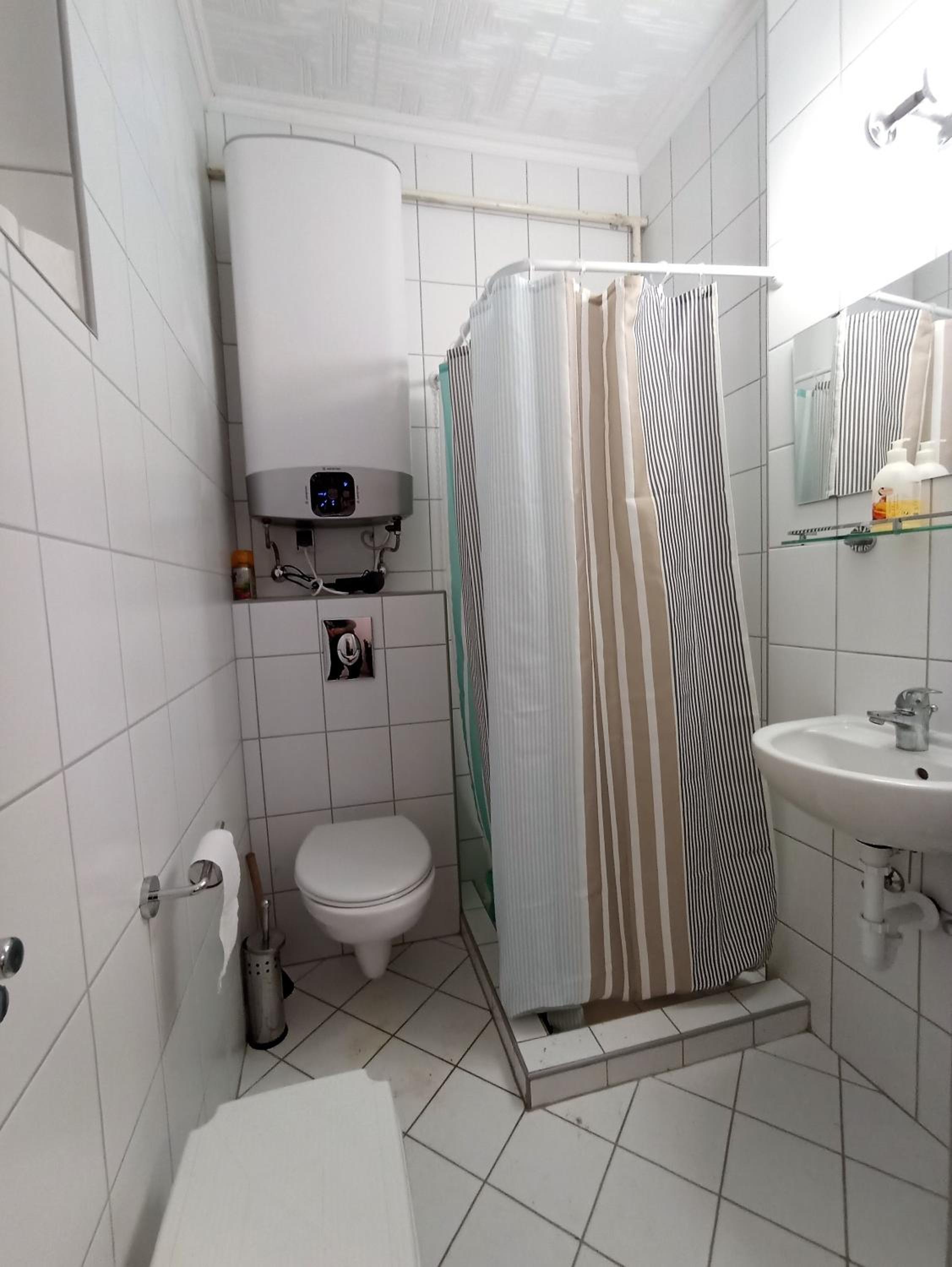 Three-Bedroom House - Photo 7