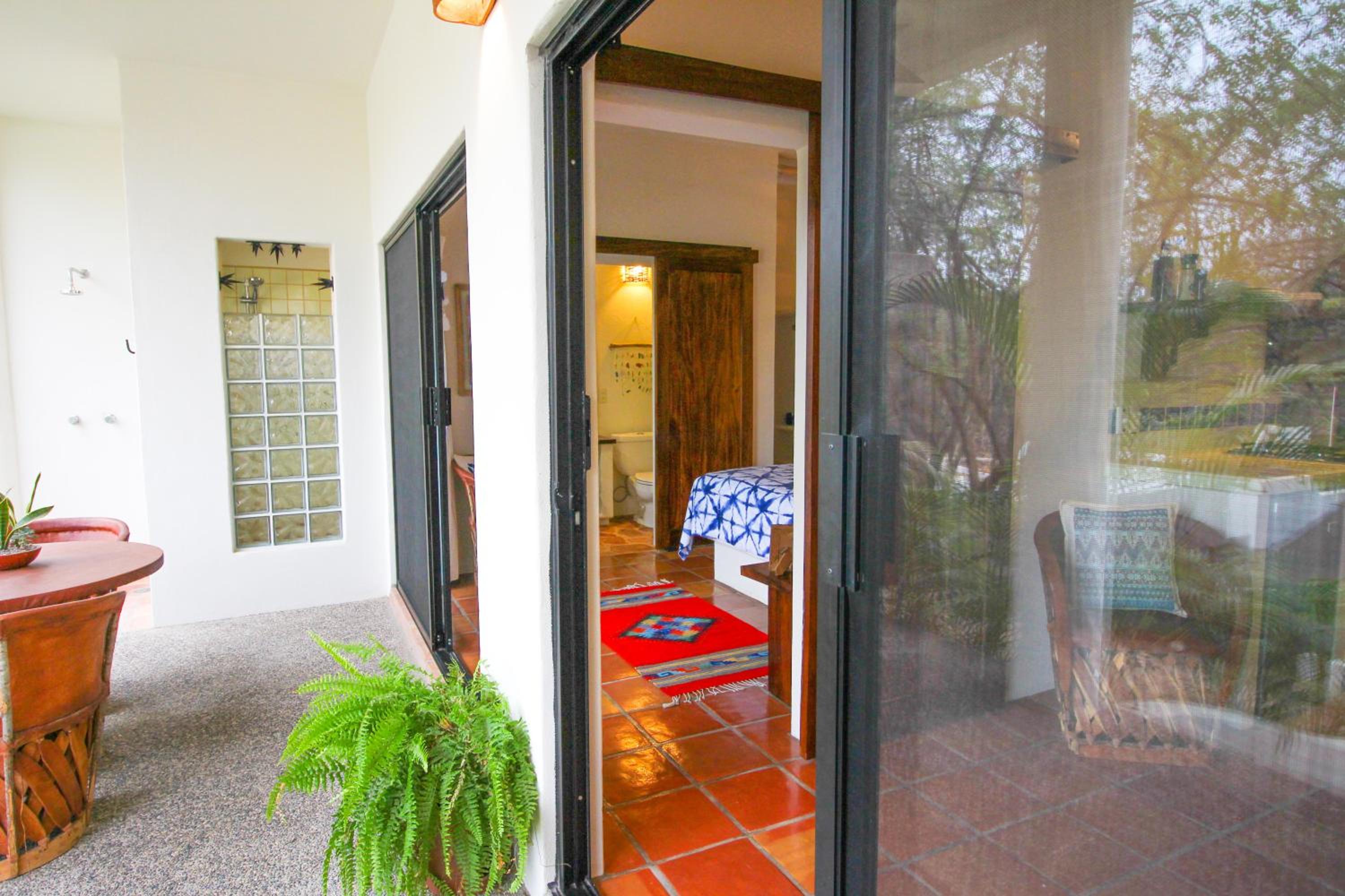 Suíte com Vista para o Jardim