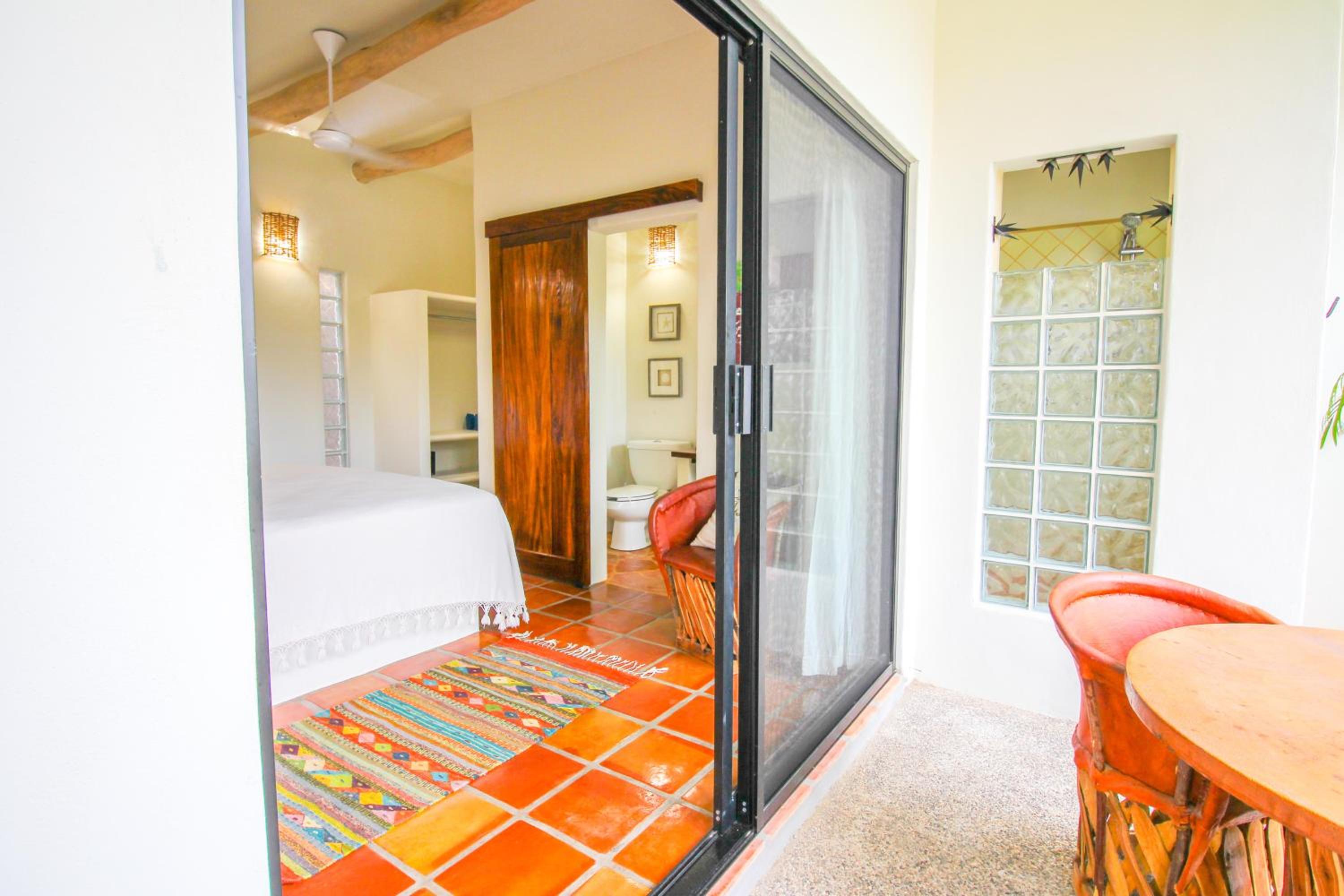 Suíte com Vista para a Piscina