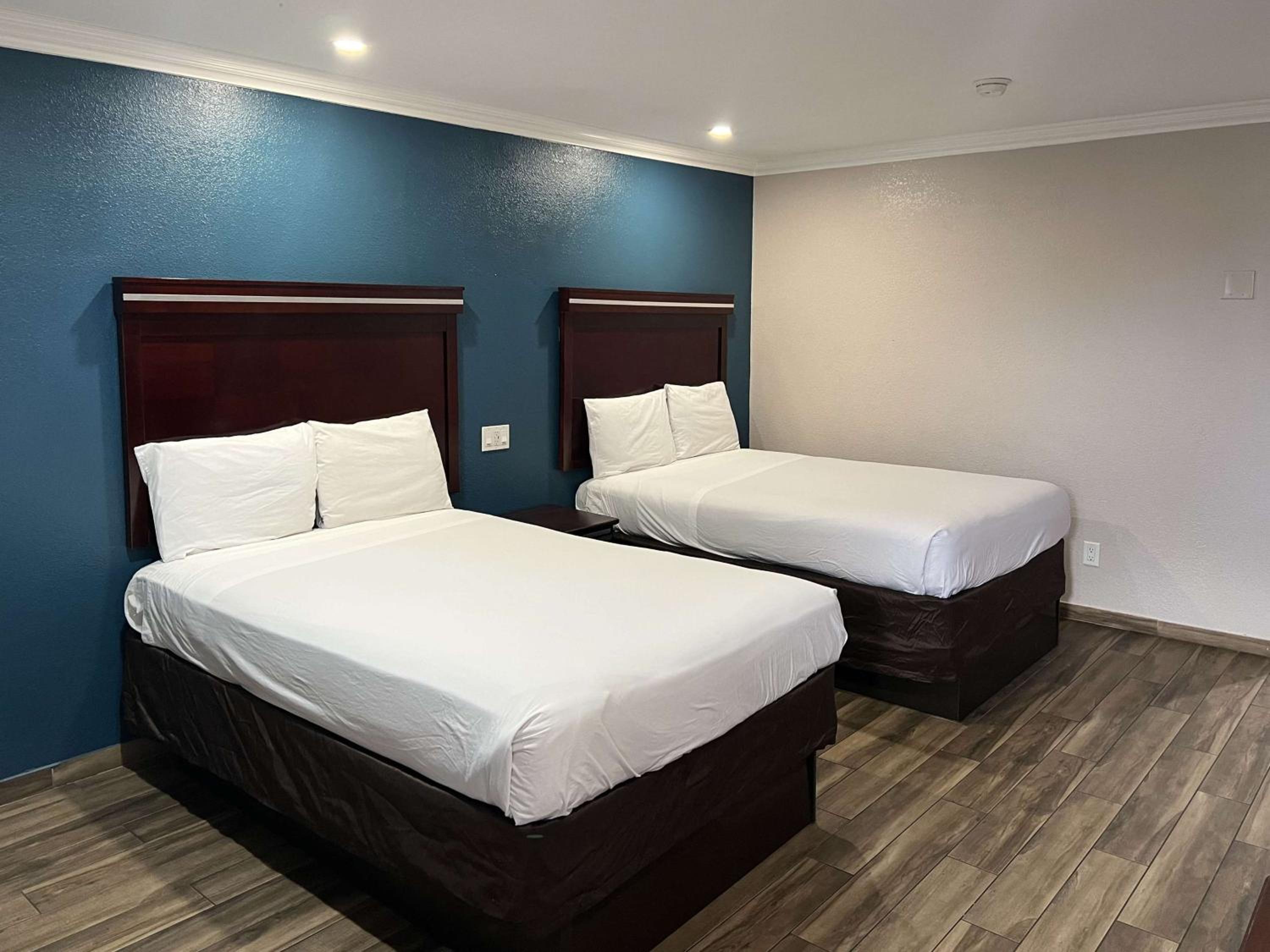 Queen Room With Two Queen Beds - Disability Access - Non-Smoking photo 1