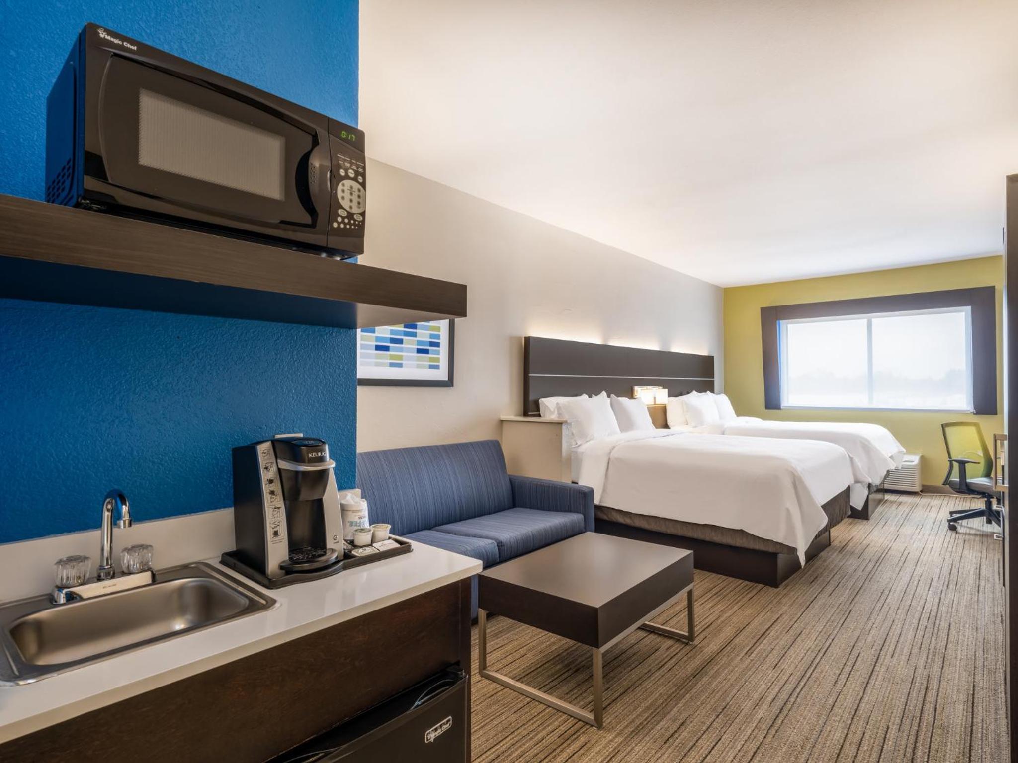 Queen Suite with Two Queen Beds and Additional Living Area - Photo 1
