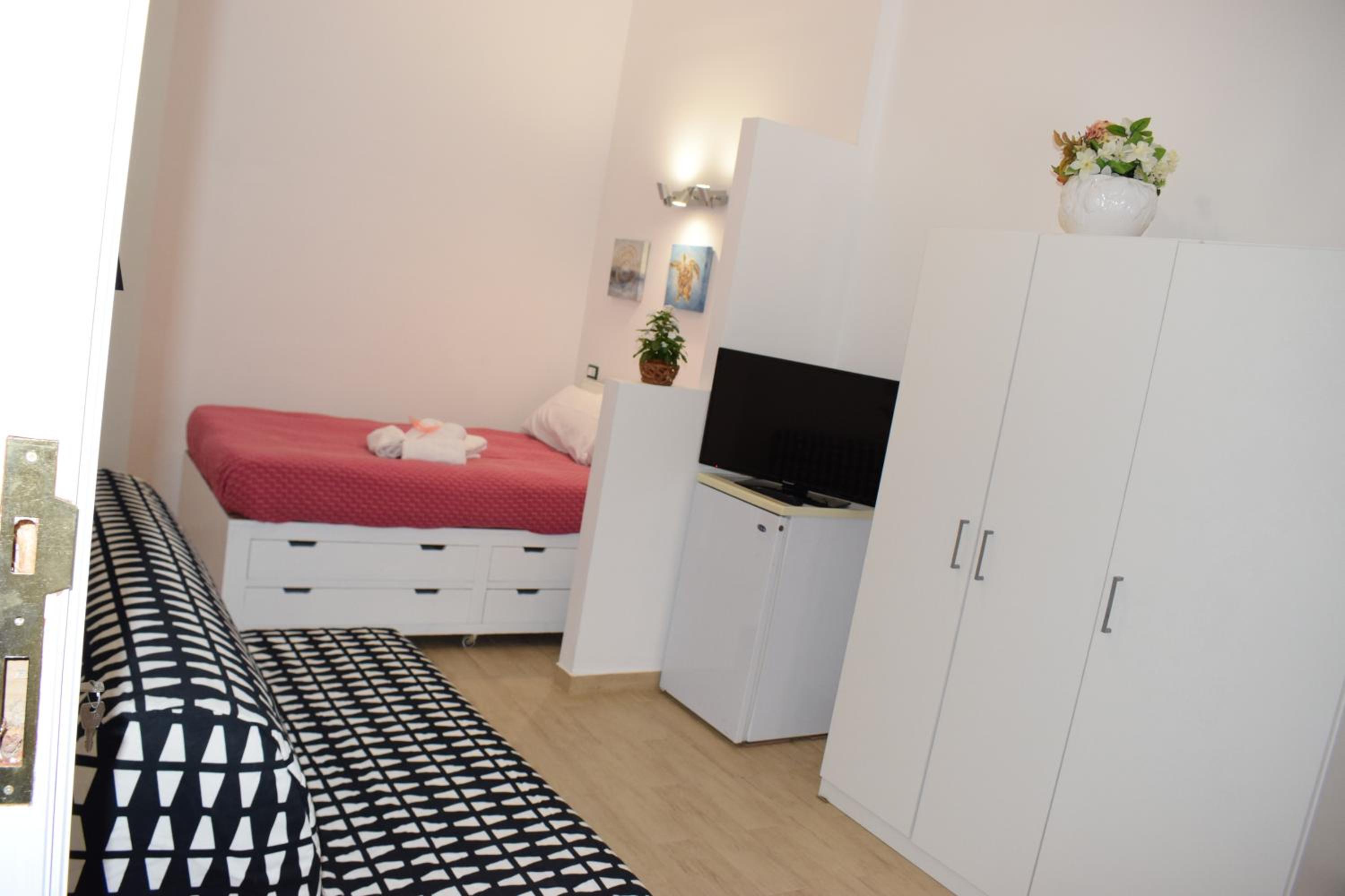 Quadruple Room With Private Bathroom