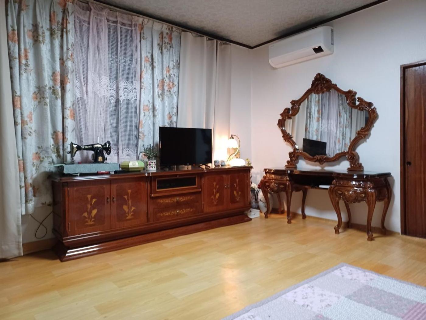 Three-Bedroom House - Photo 56