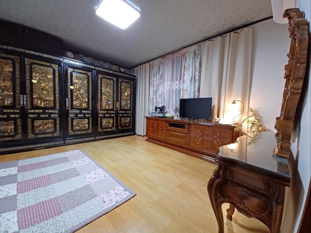 Three-Bedroom House - Photo 58