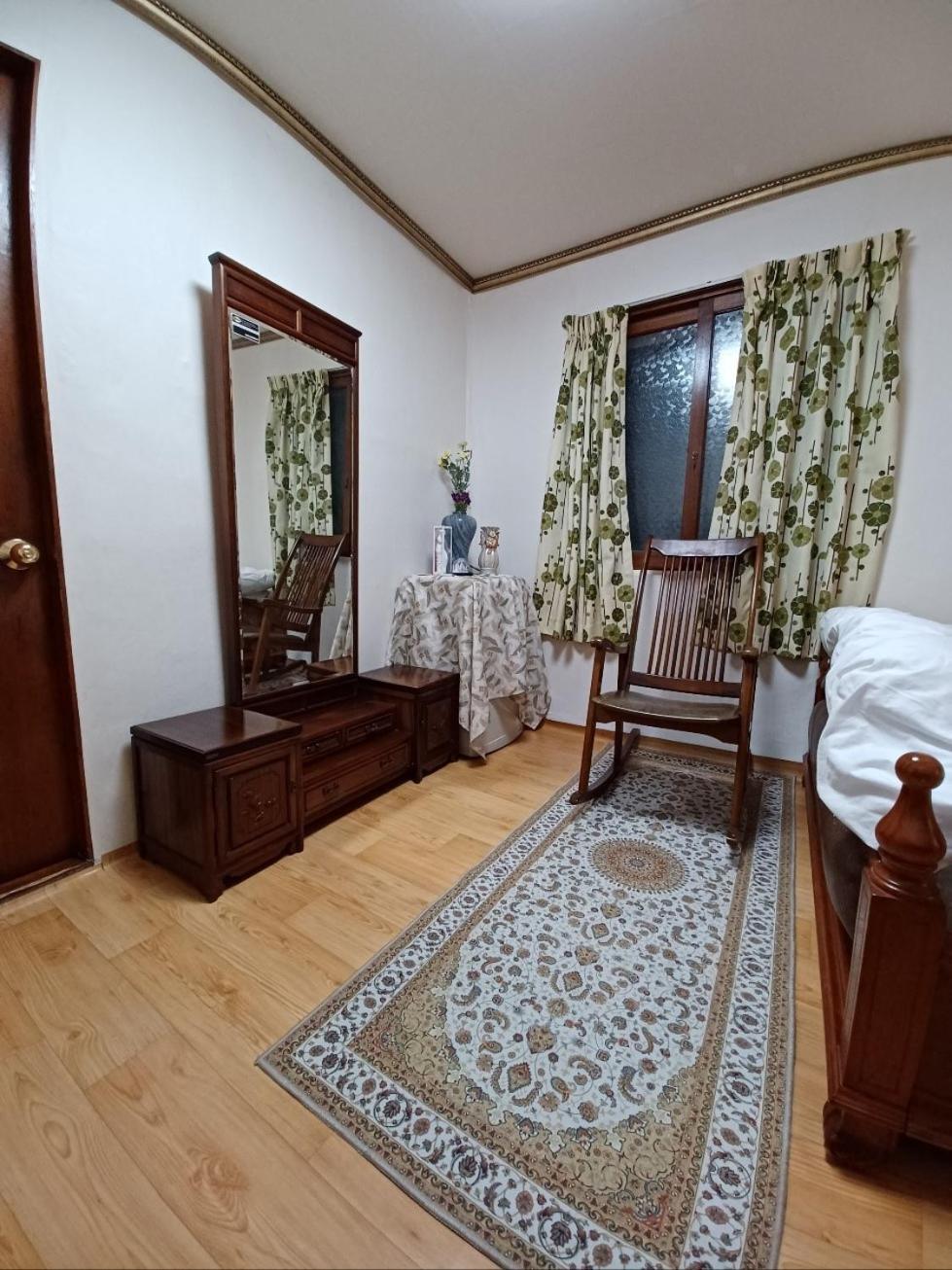 Three-Bedroom House - Photo 67