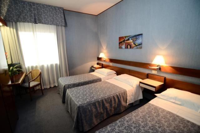 Standard Triple Room - Photo 1