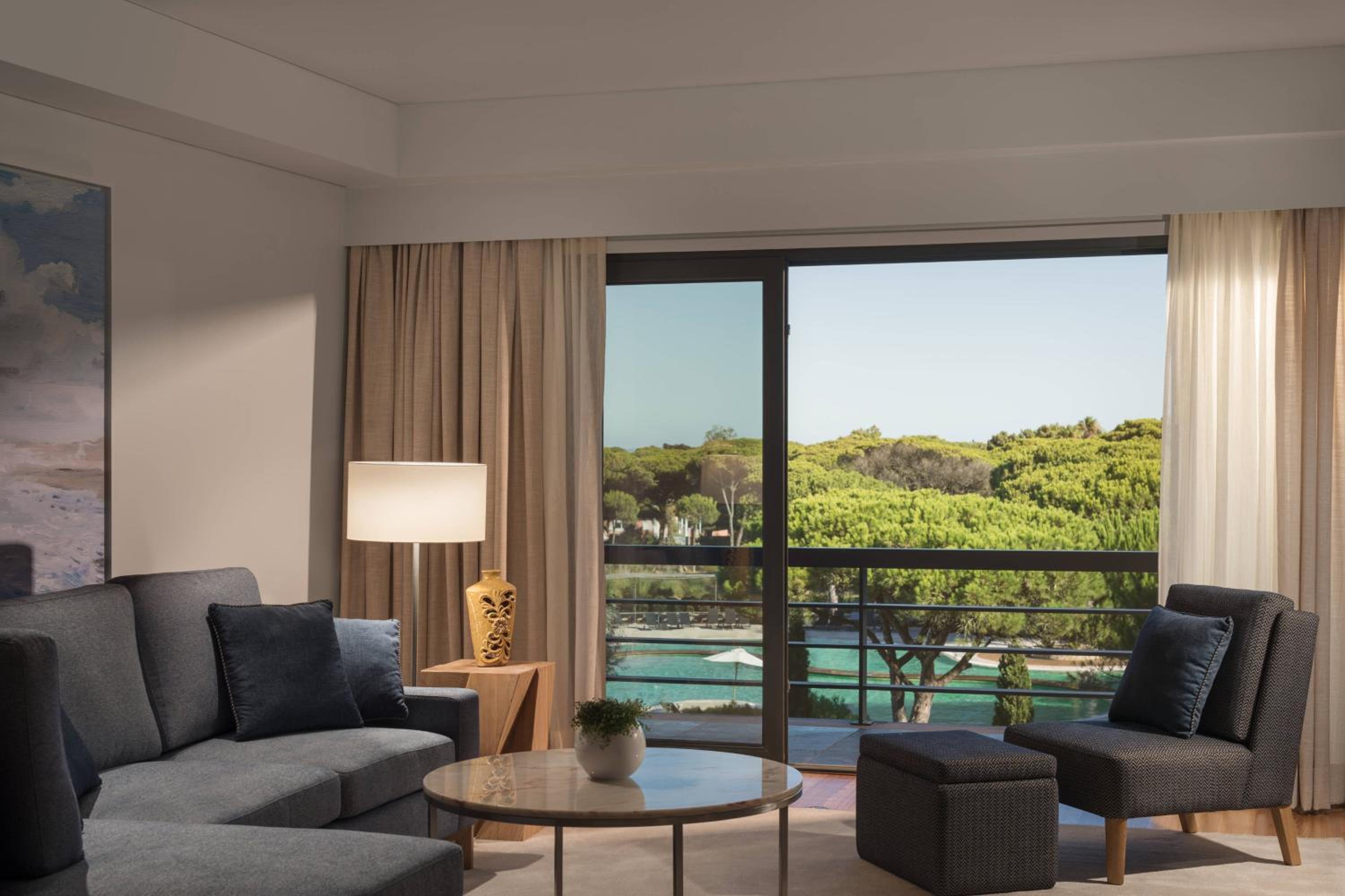 Premium Four-Bedroom Residence with Balcony and Garden View