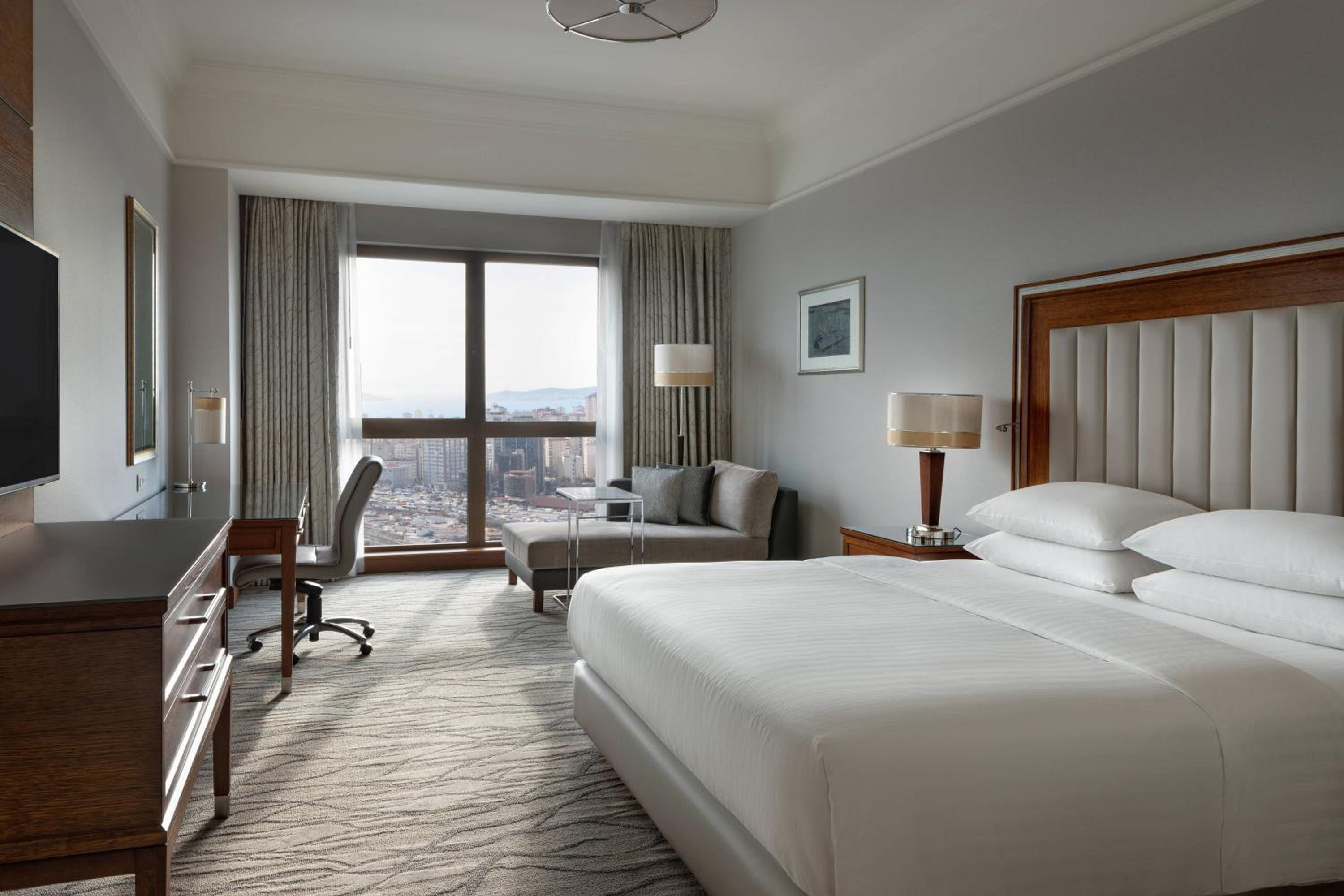 Deluxe Room with King Bed and City View
