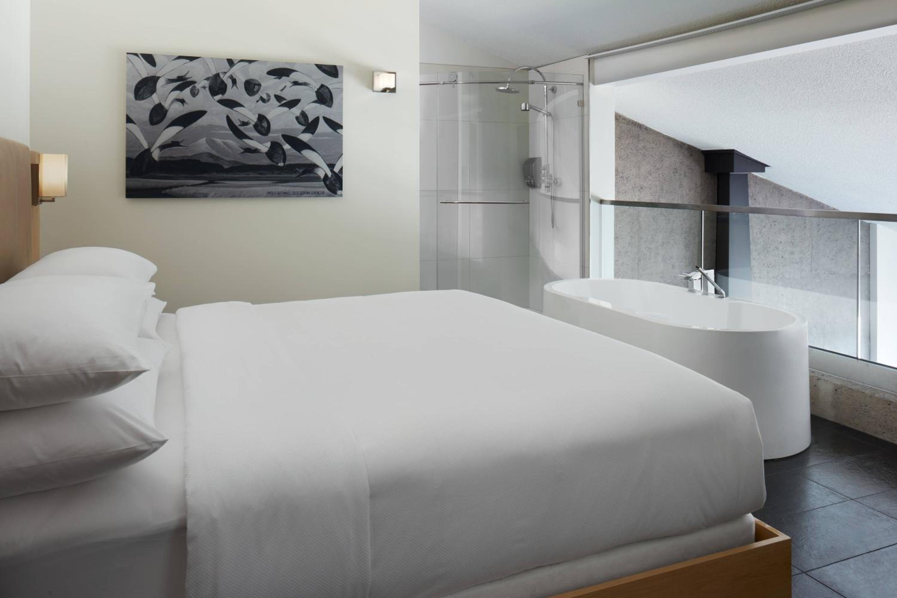 Two-Bedroom Penthouse Suite with One King Bed and Two Twin Beds with Sofa Bed - Photo 5
