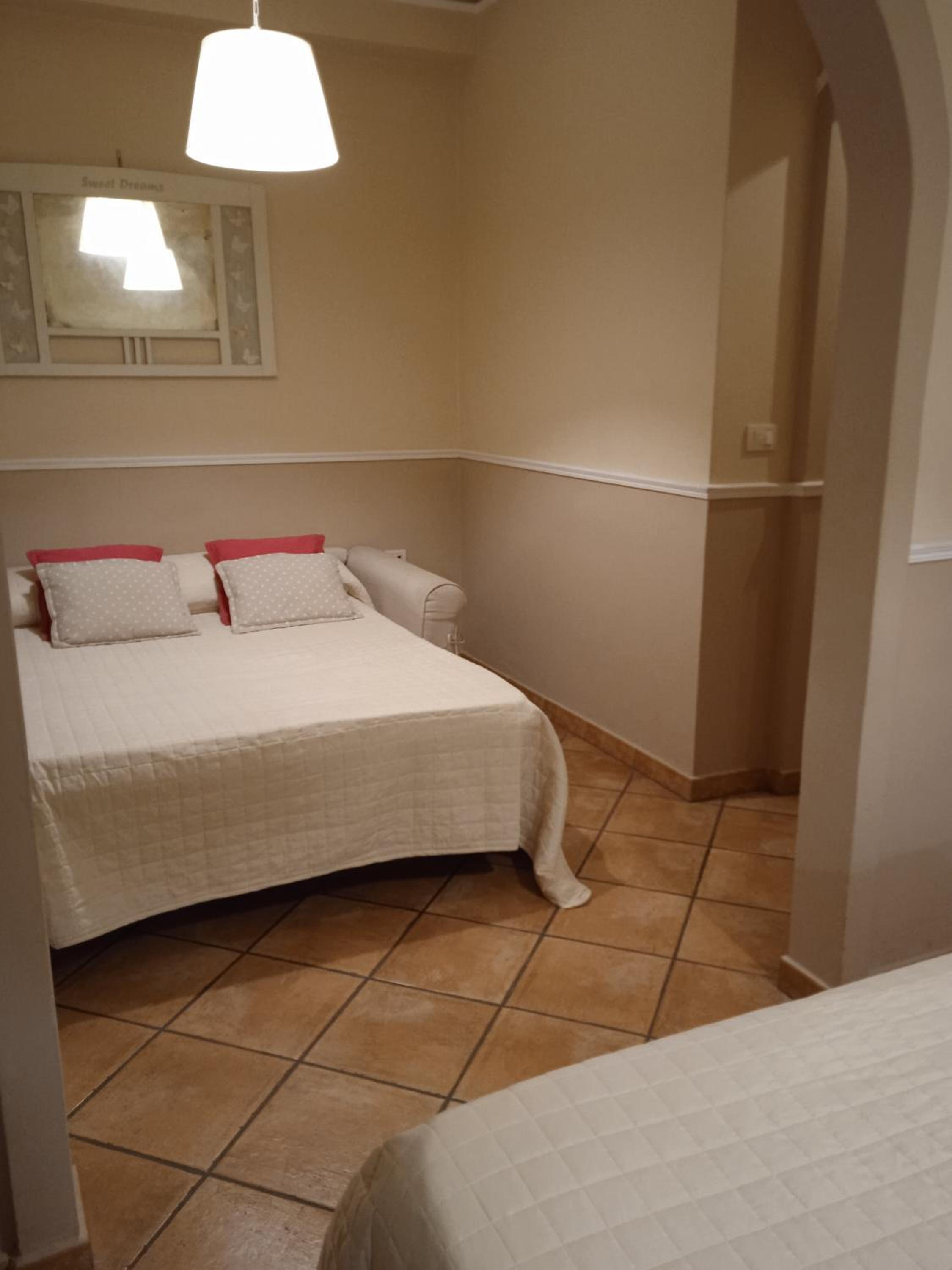 Quadruple Room - Photo 9