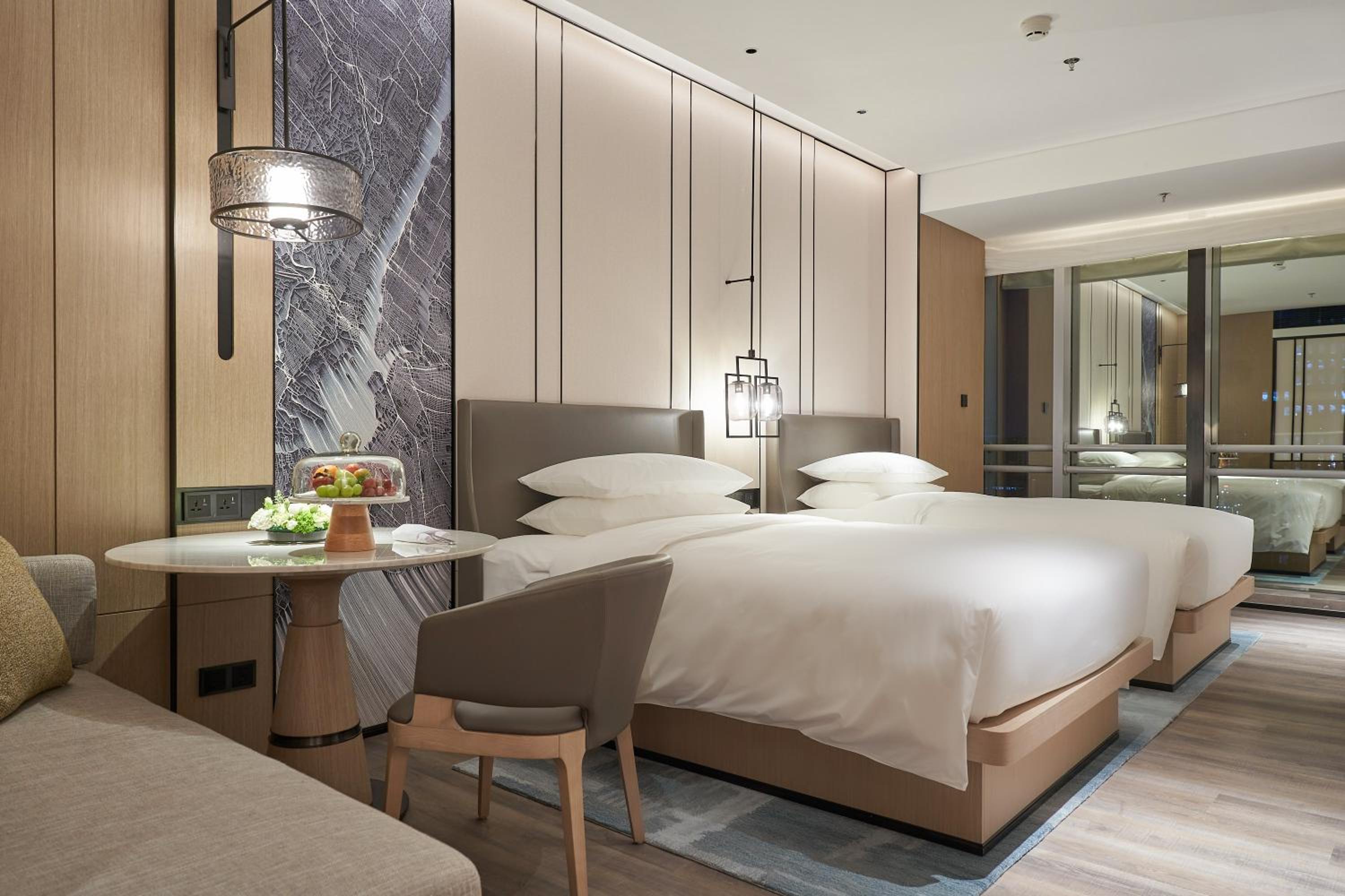 Deluxe Corner Double Room with Two Double Beds and City View
