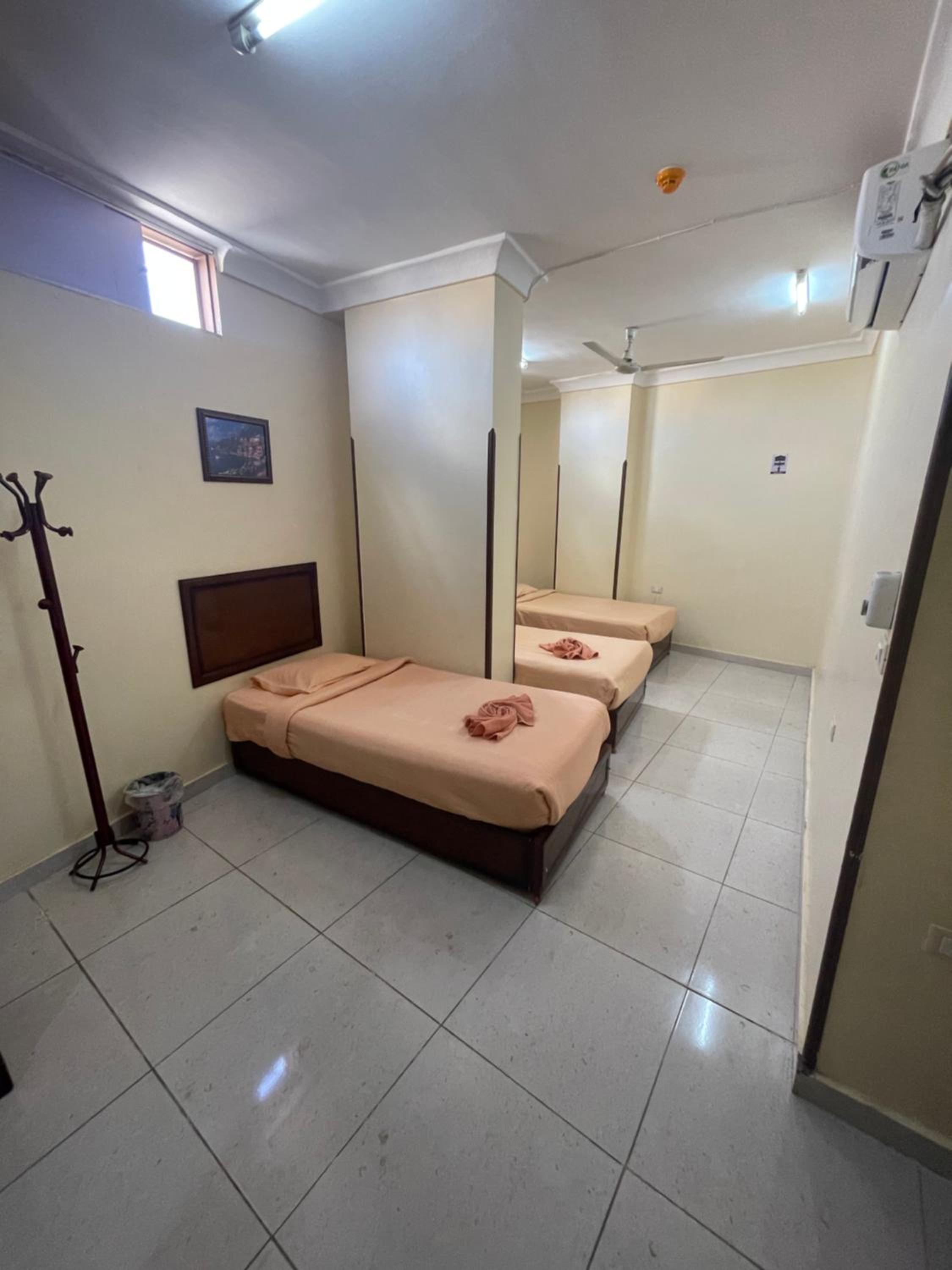 Economy Triple Room - Photo 1