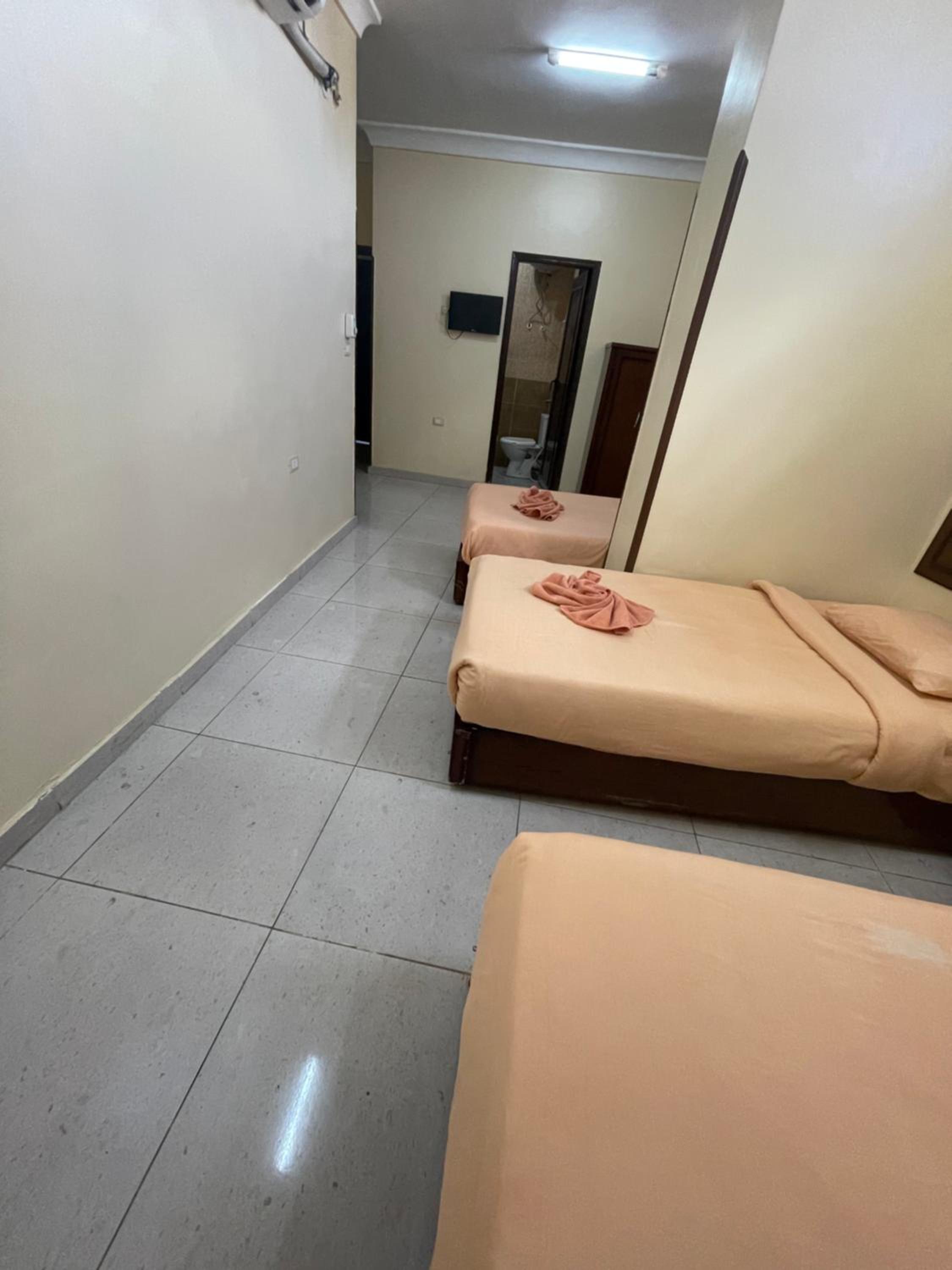 Economy Triple Room - Photo 2