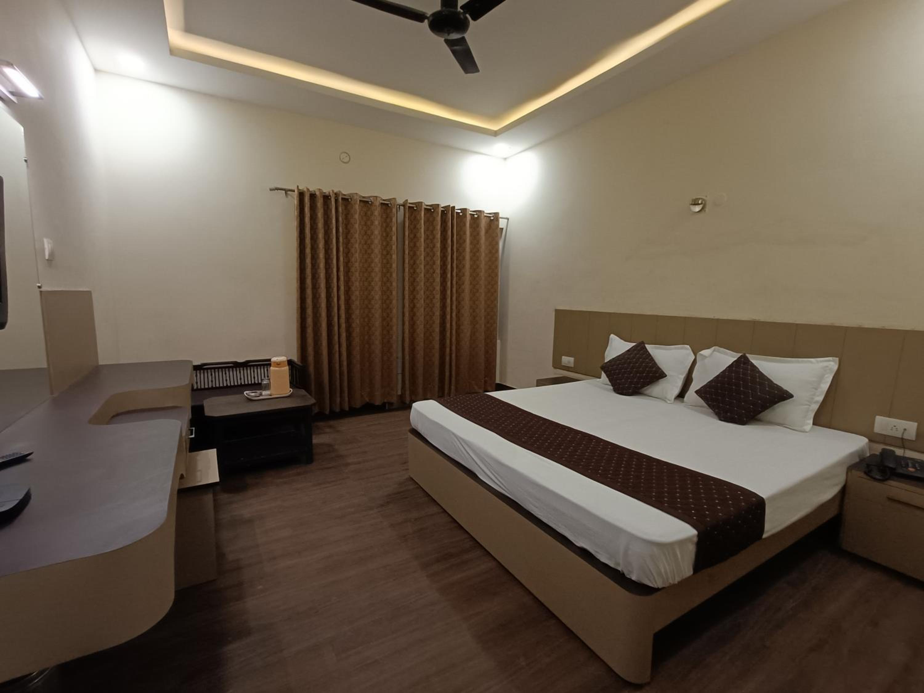 Deluxe Room - Photo 1