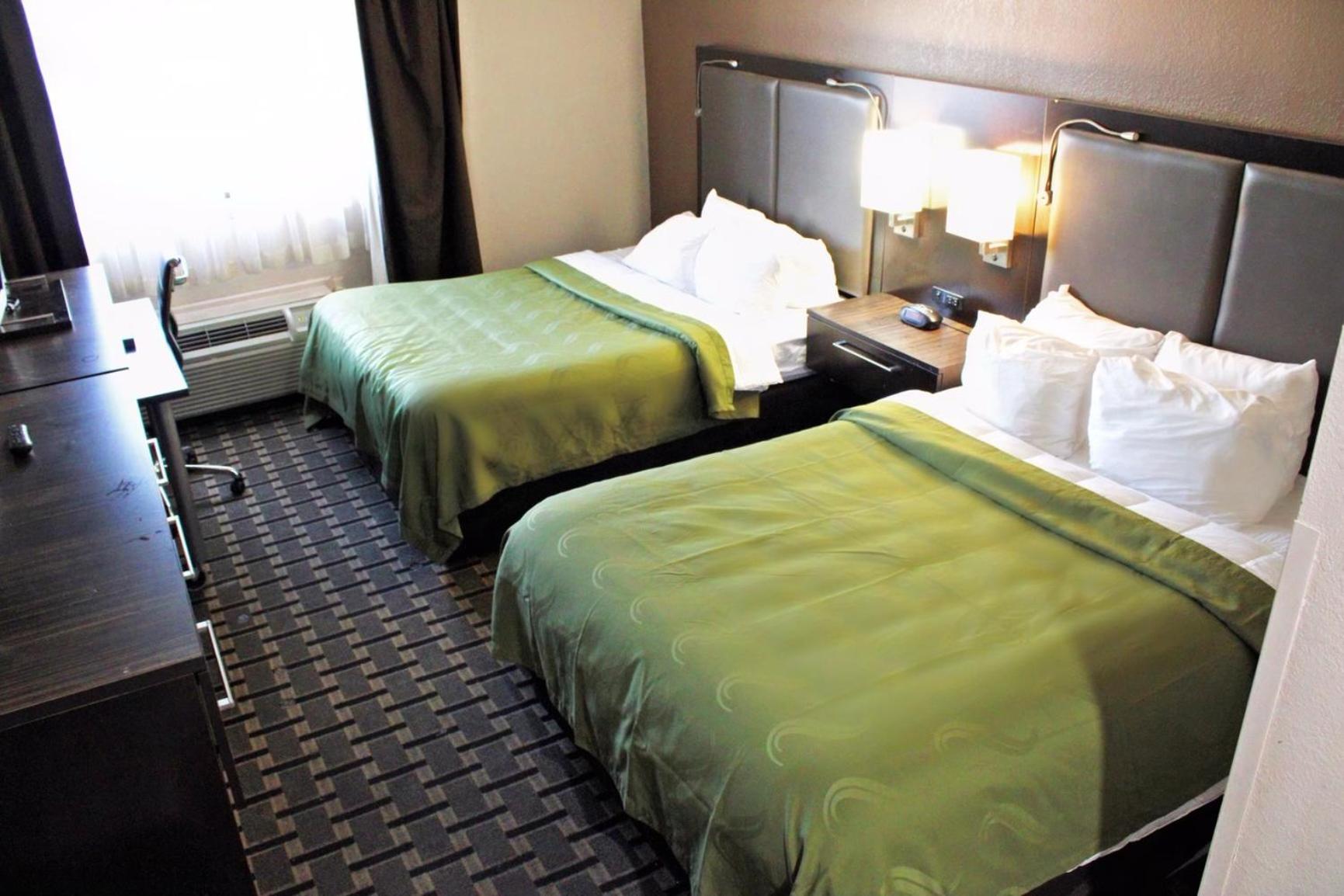 Queen Room with Two Queen Beds - Non-Smoking - Photo 1