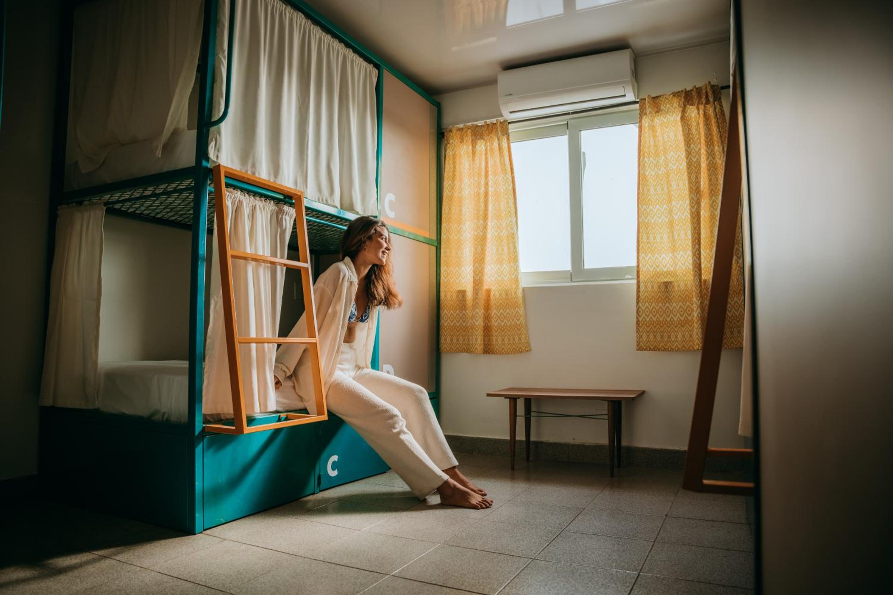 Bed in 8-Bed Mixed Dormitory Room with Private Bathroom photo 1