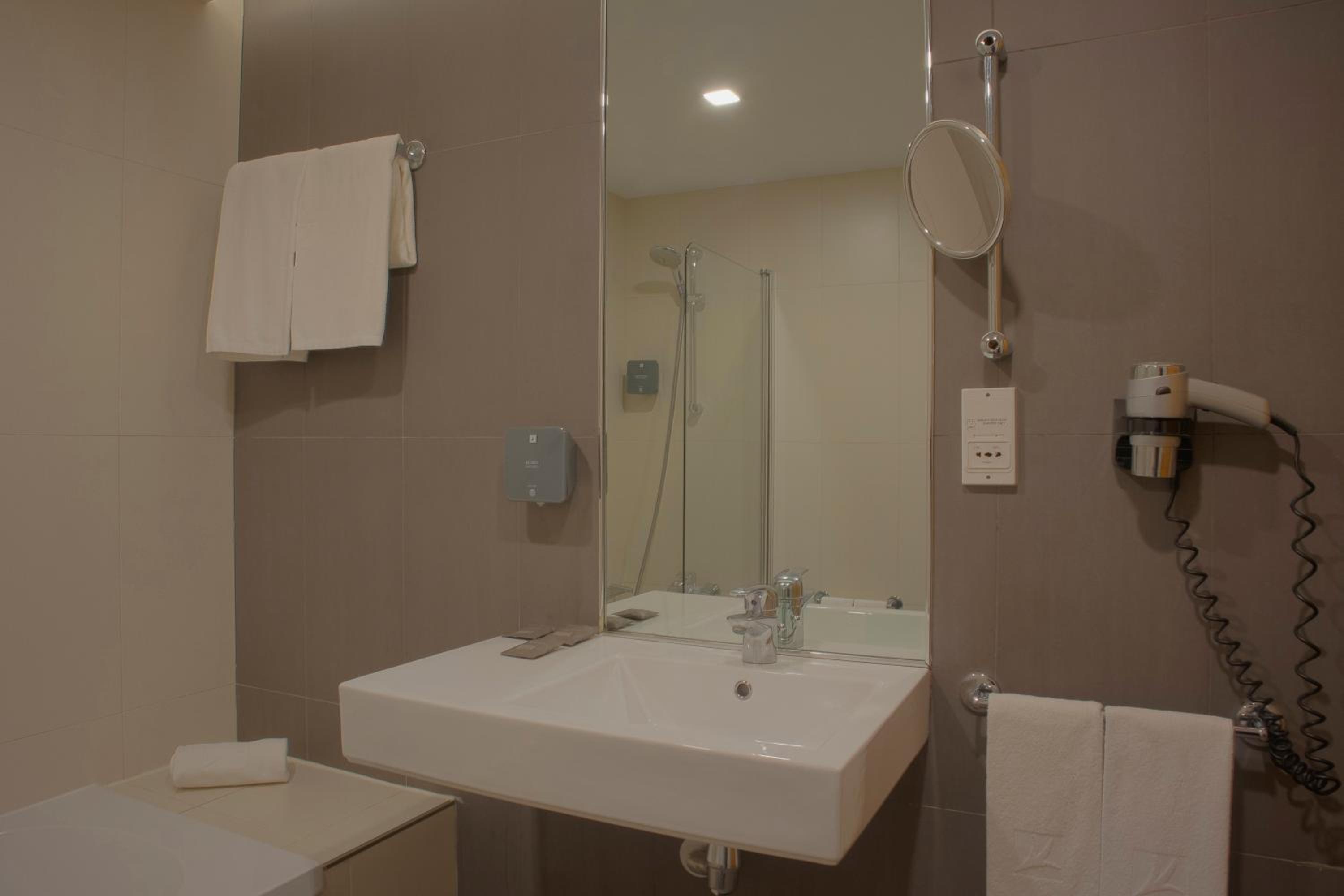 Relax in a stylish and modern bathroom retreat.