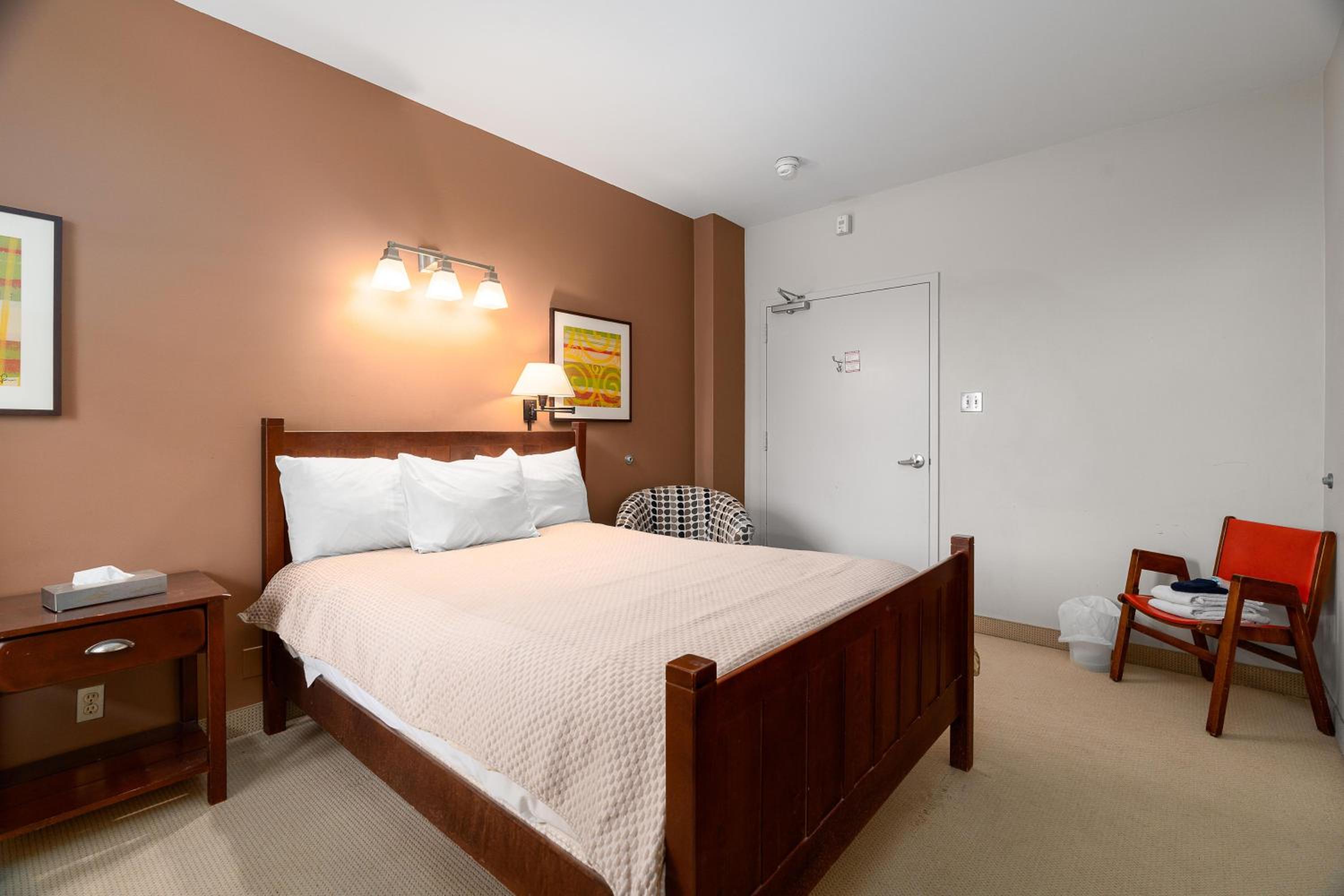 Queen Bed with Shared Bathroom