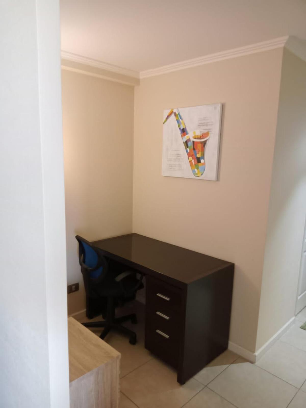 Three-Bedroom Apartment photo 2