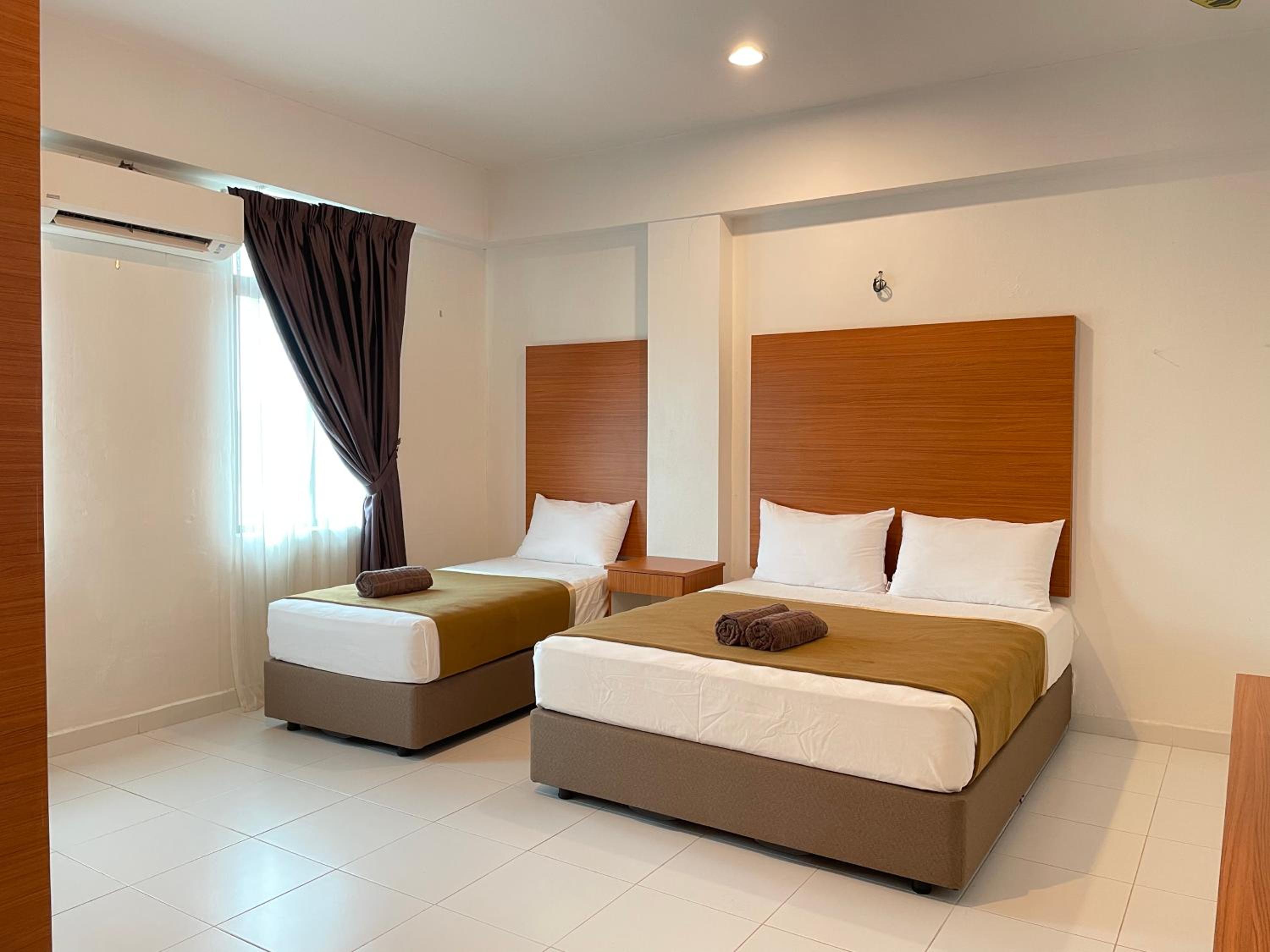 Deluxe Triple Room - Photo 1