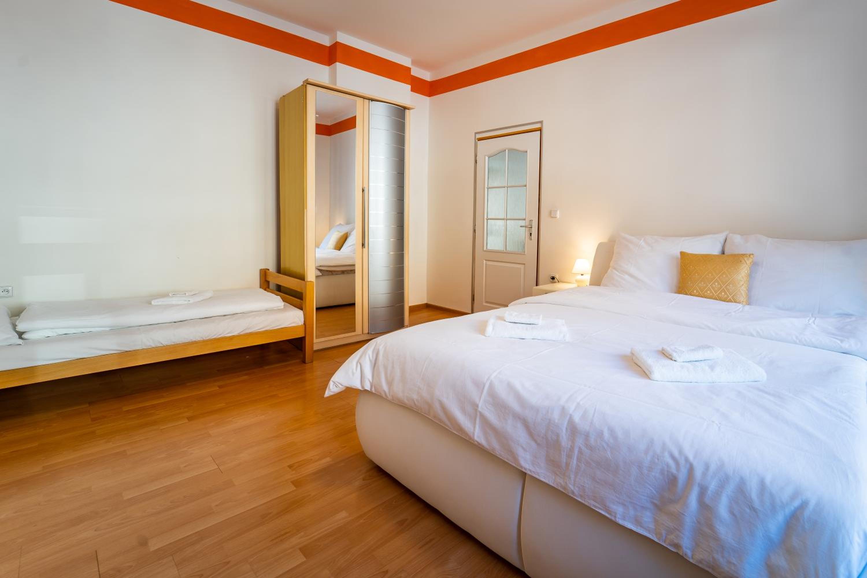 Three-Bedroom Apartment - Photo 11