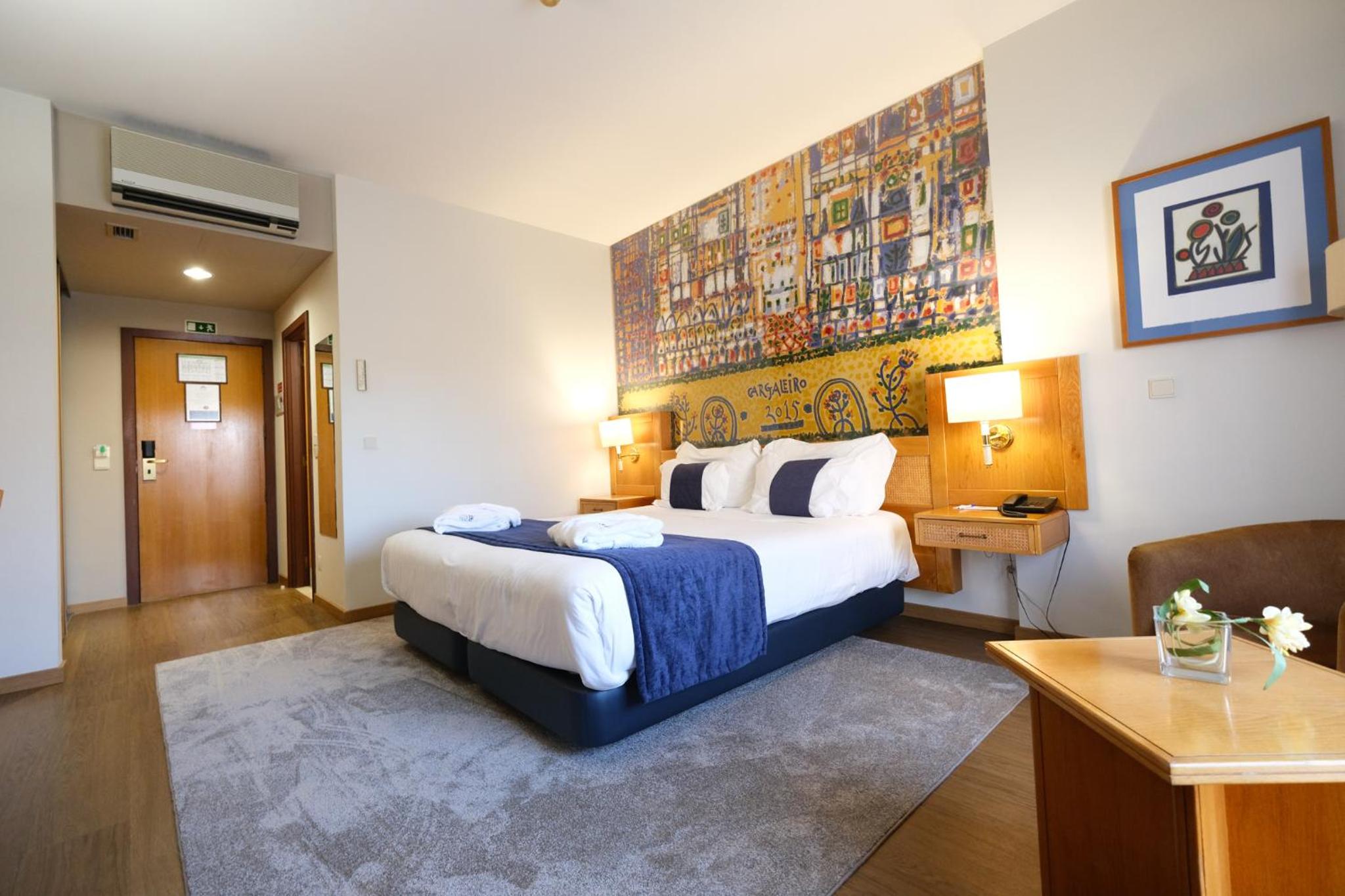 Deluxe King Room - Photo 1