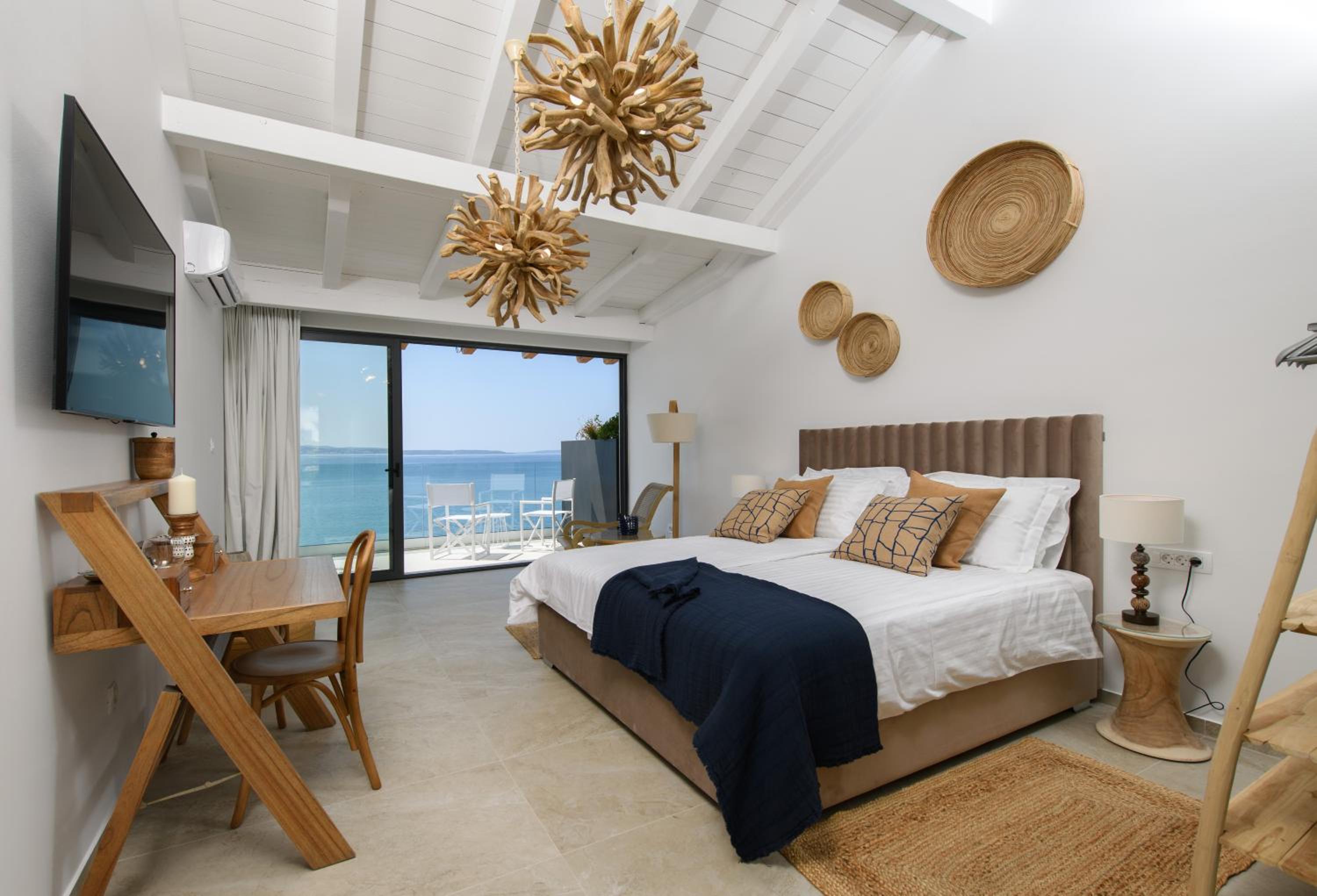 De Luxe Doppelzimmer mit Balkon und Meerblick