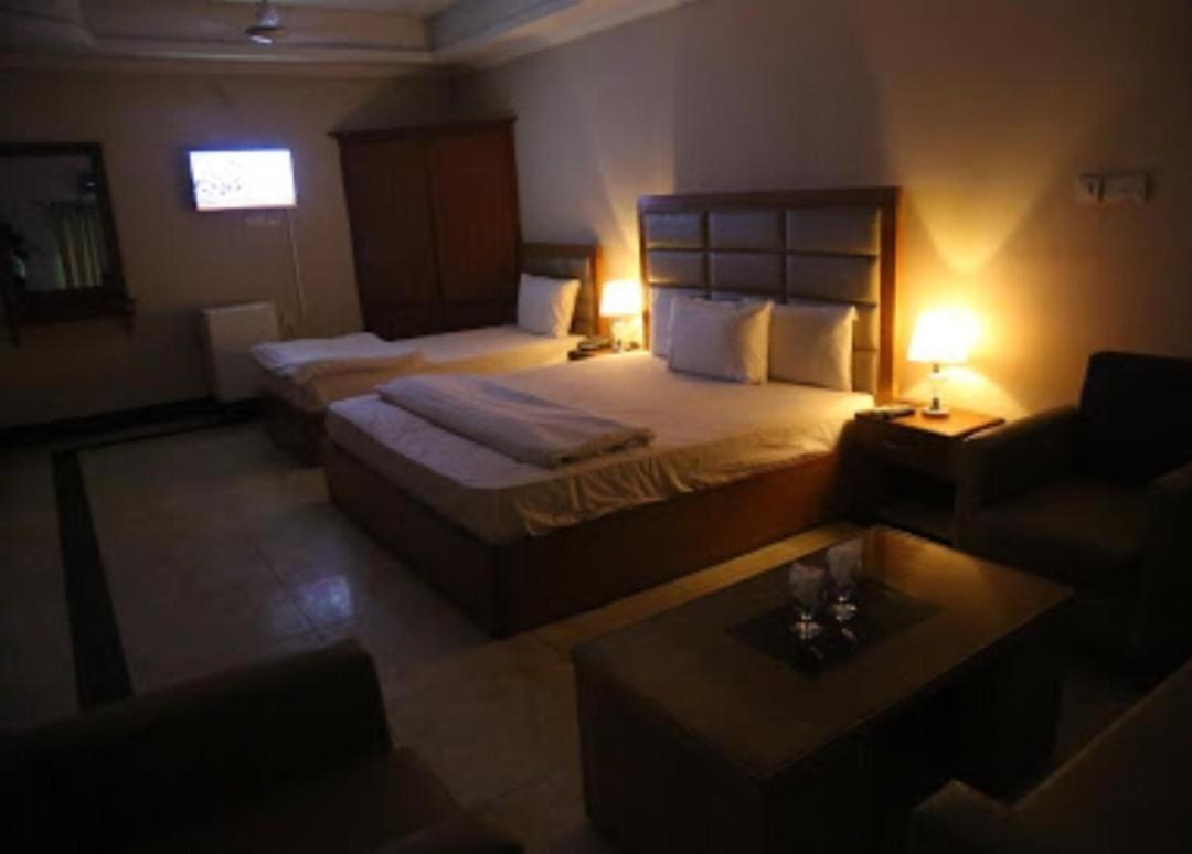 Deluxe Triple Room - Photo 11