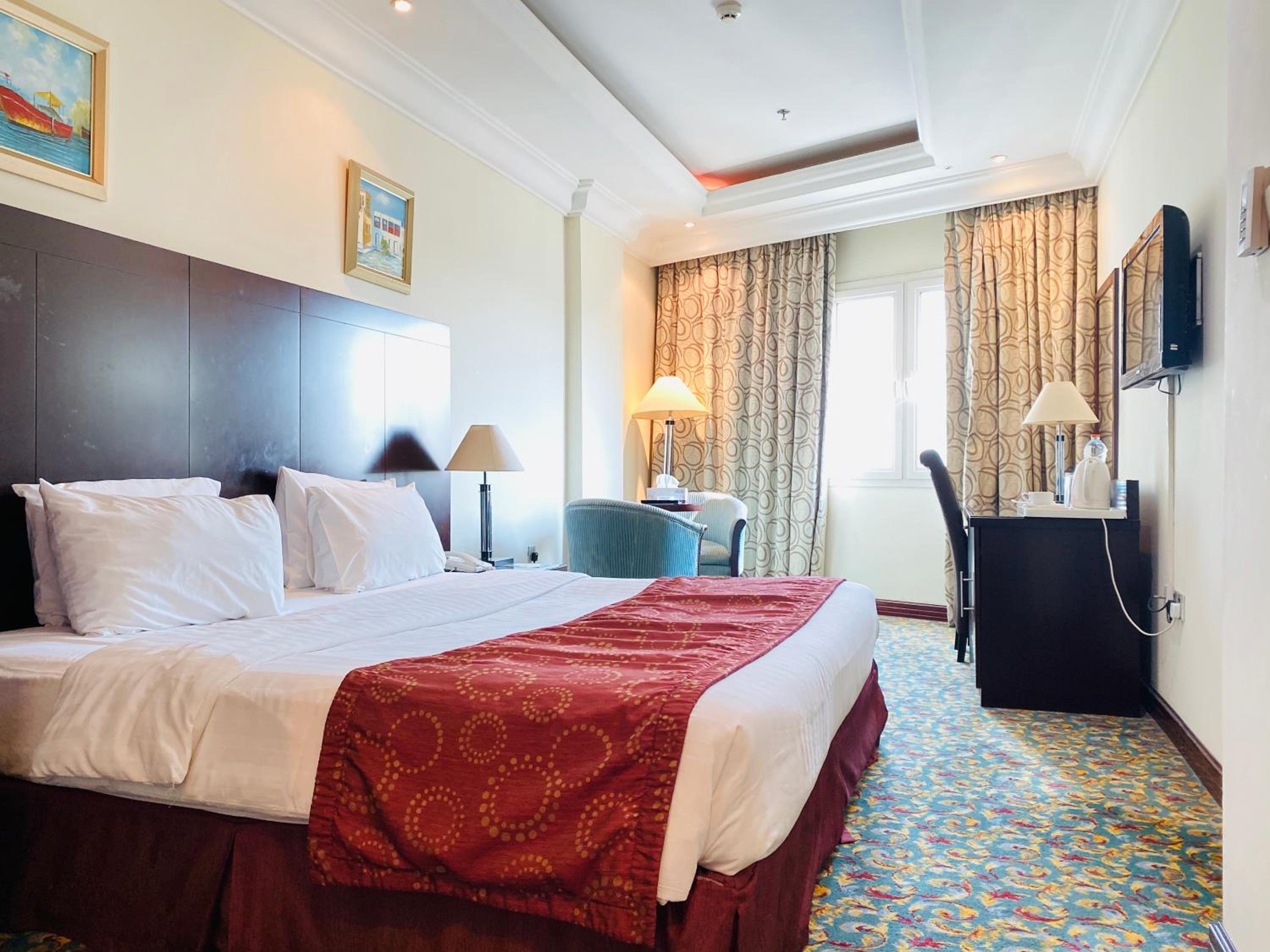 Deluxe Room - Photo 1