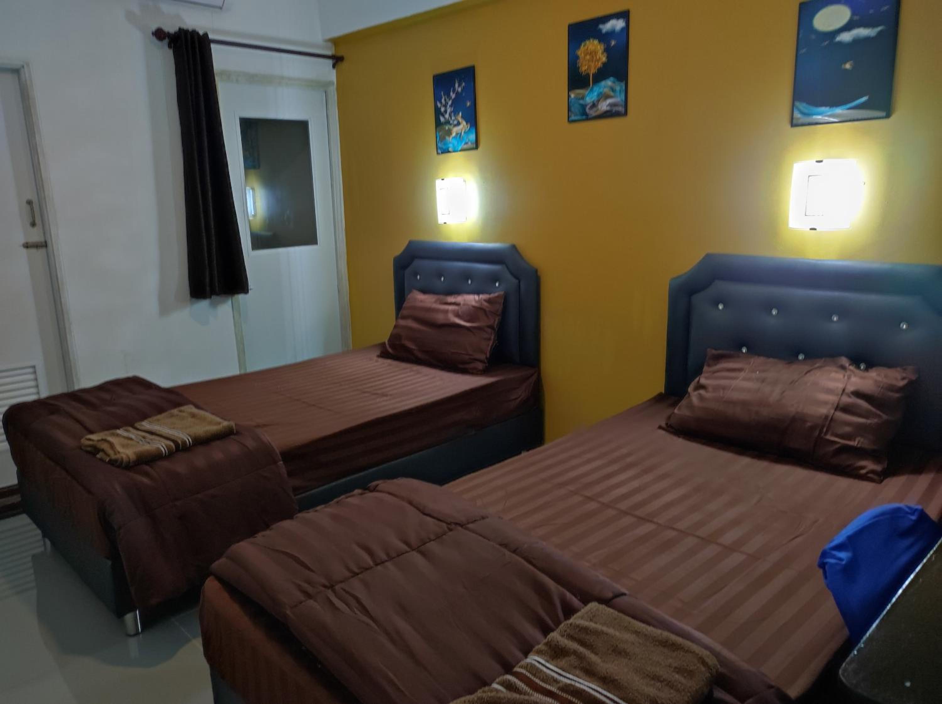 Standard Twin Room - Photo 9