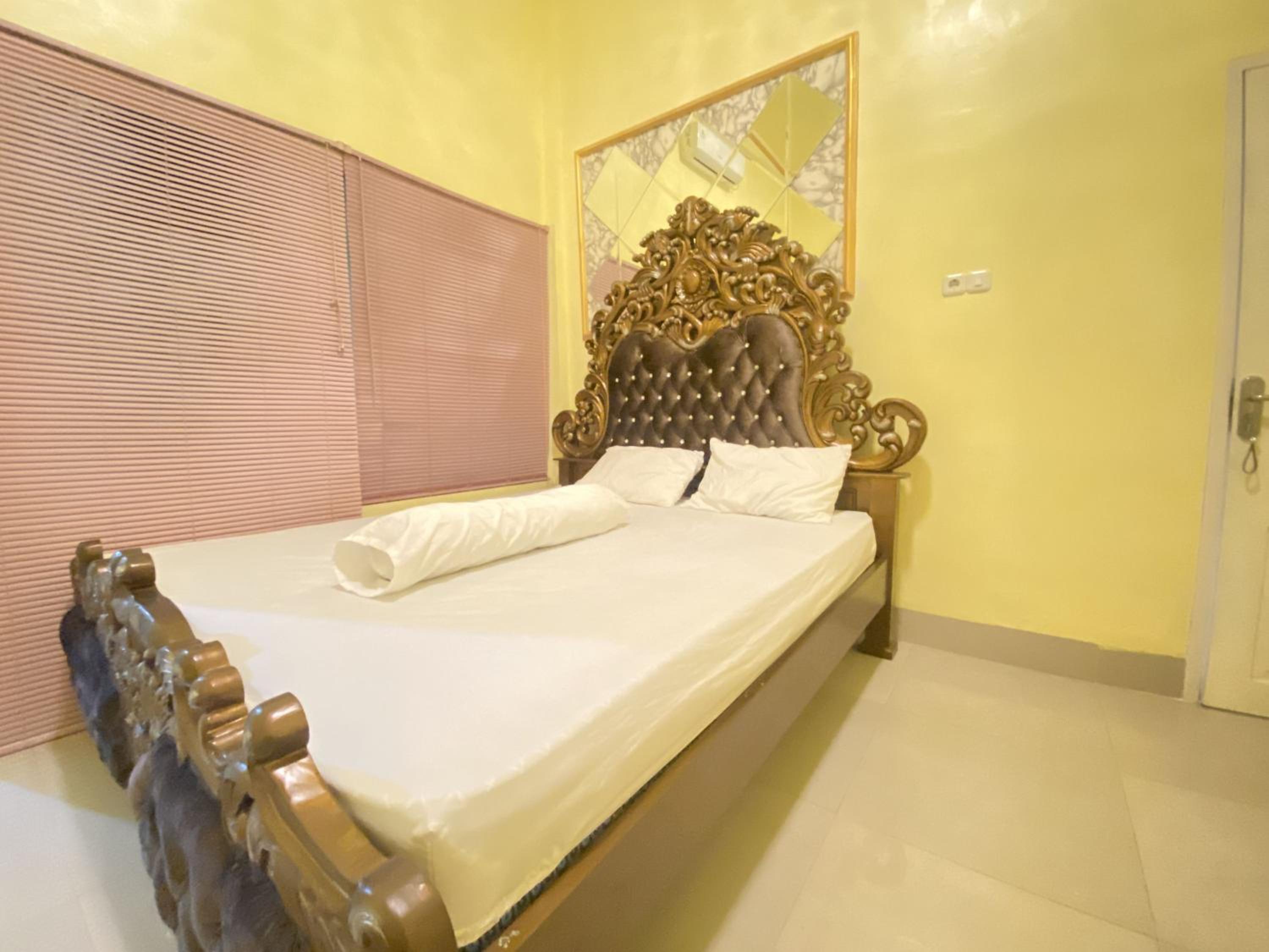 Deluxe Room - Photo 2