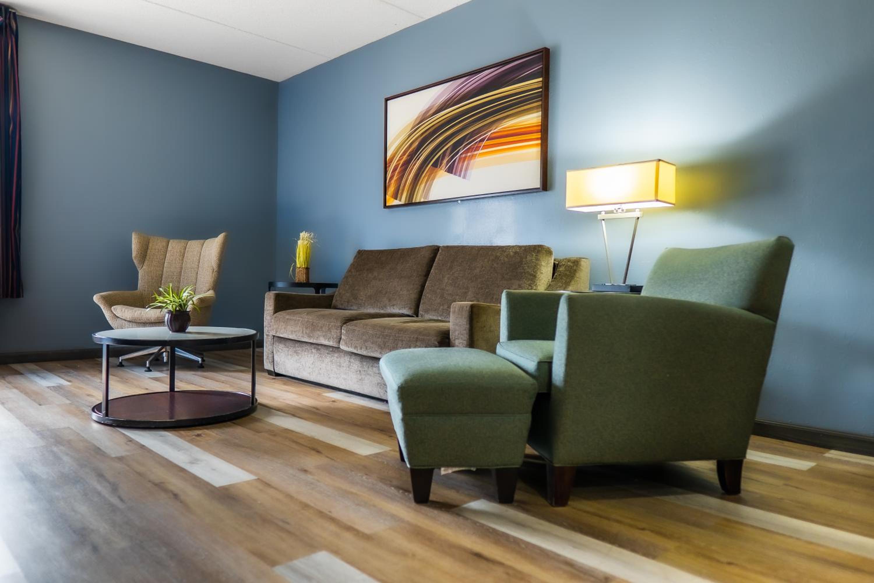 living room with a couch, chair and coffee table