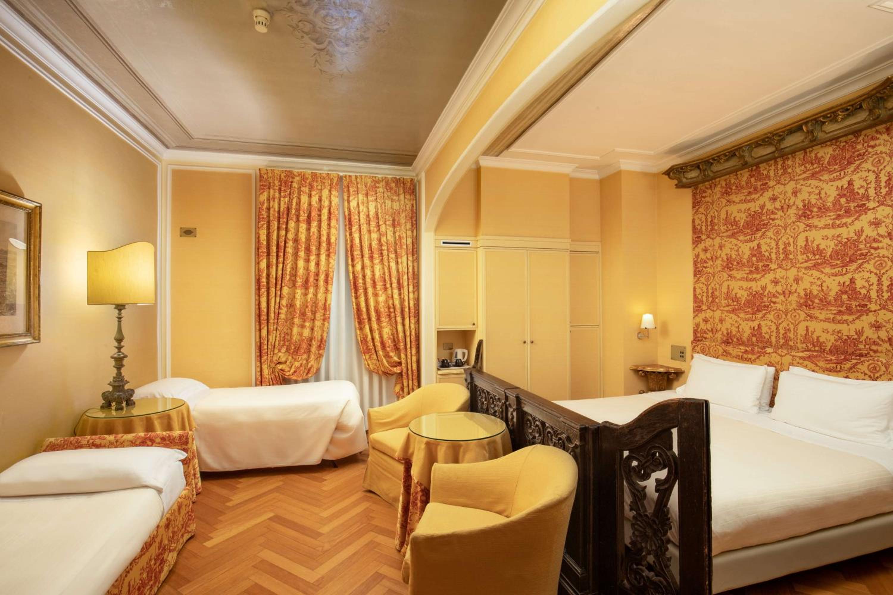 Standard Family Room with One Queen Bed and Two Single Beds - Non-Smoking thumbnail 5
