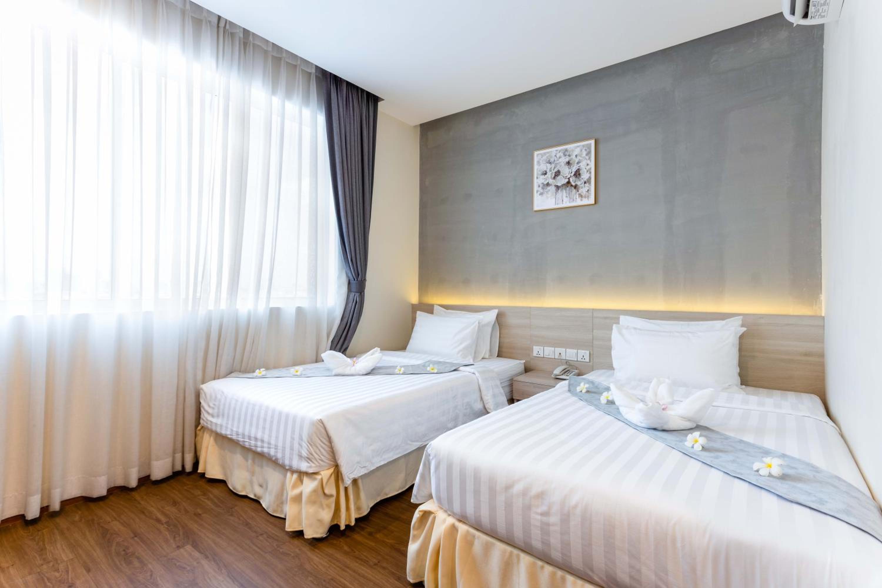 Deluxe Twin Room - Photo 8