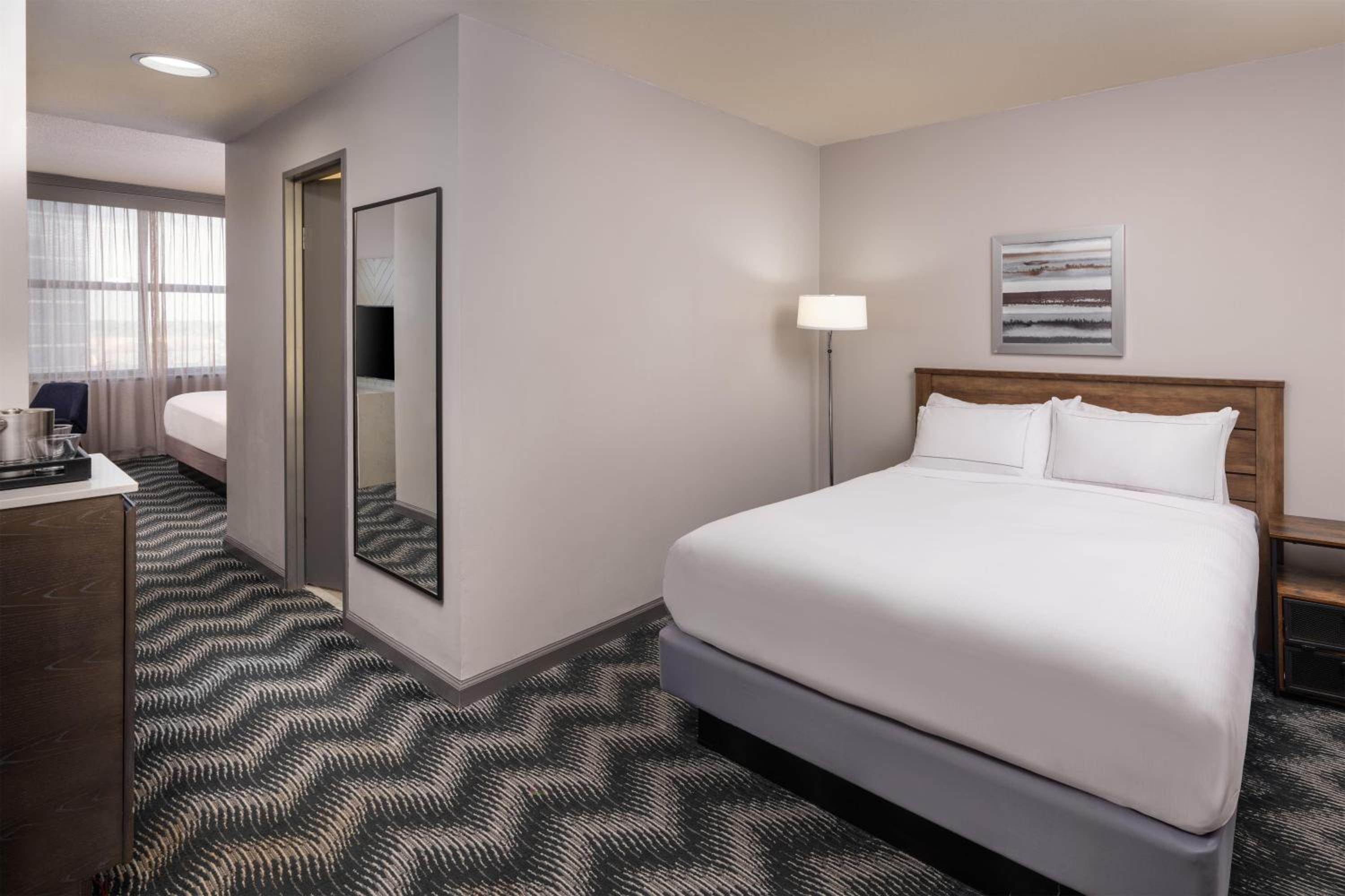 Studio Suite with One King Bed and One Queen Bed photo 1