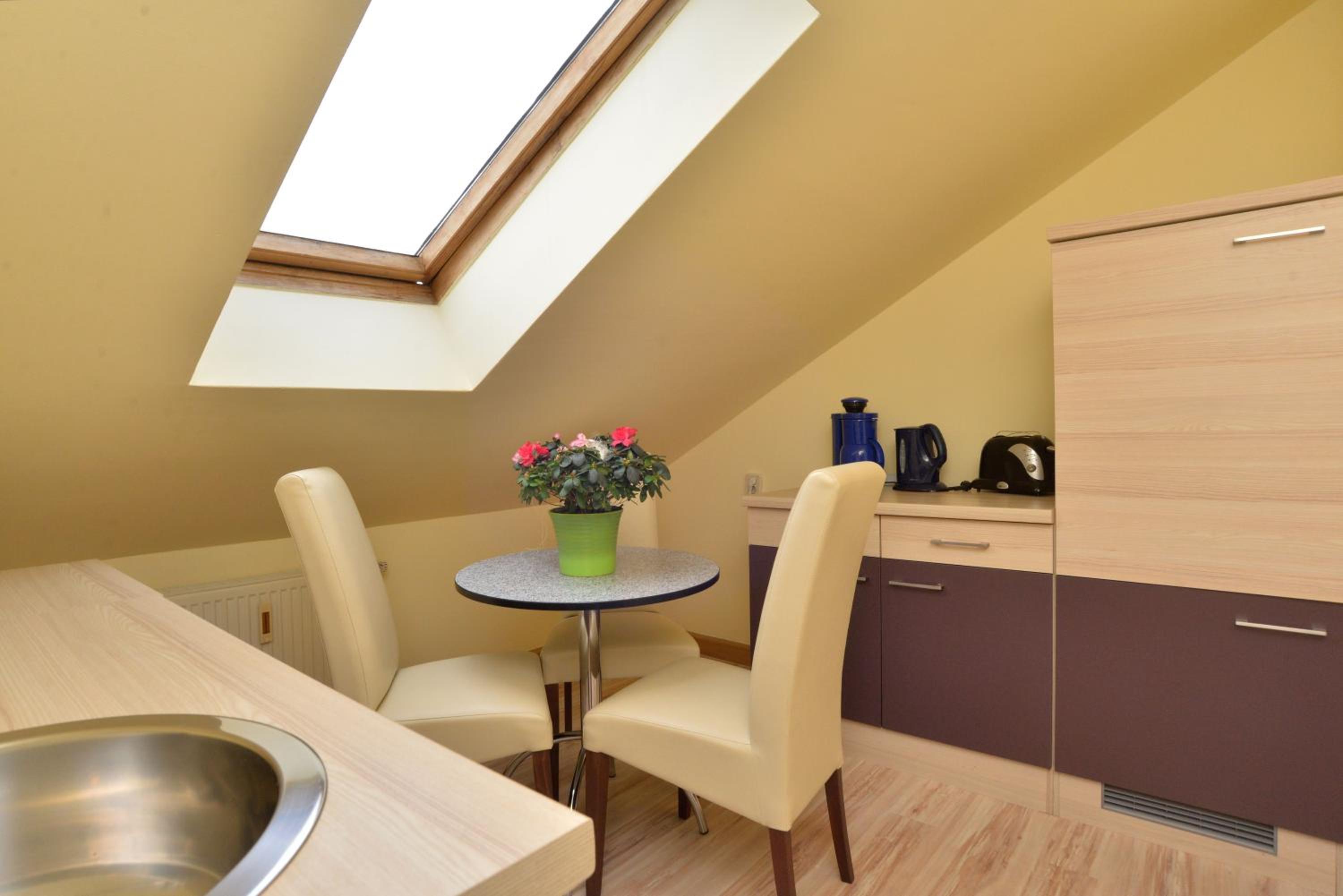 Two-Bedroom Apartment / Family Room - Photo 2