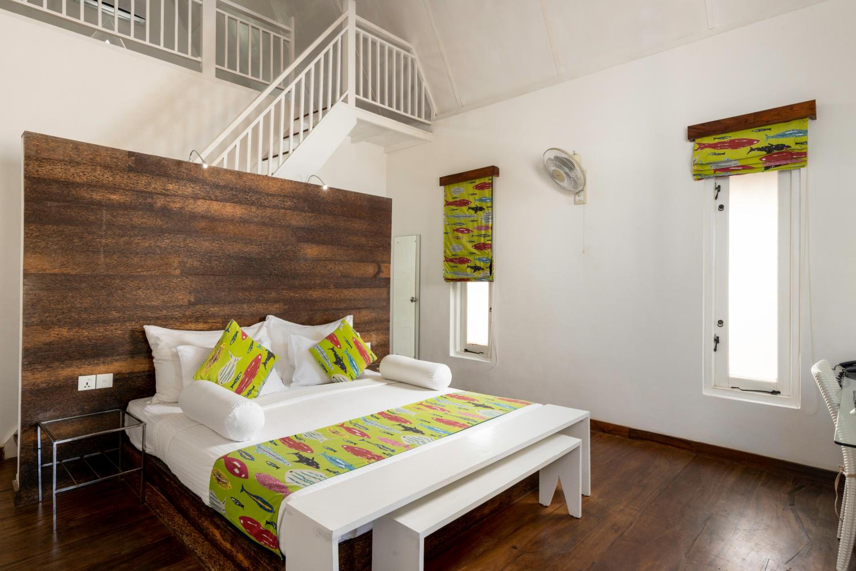 Deluxe Attic Family Room with a unique Yaara Tea experience and enjoy complimentary access to the Night Club, Karaoke, and Foosball. photo 3