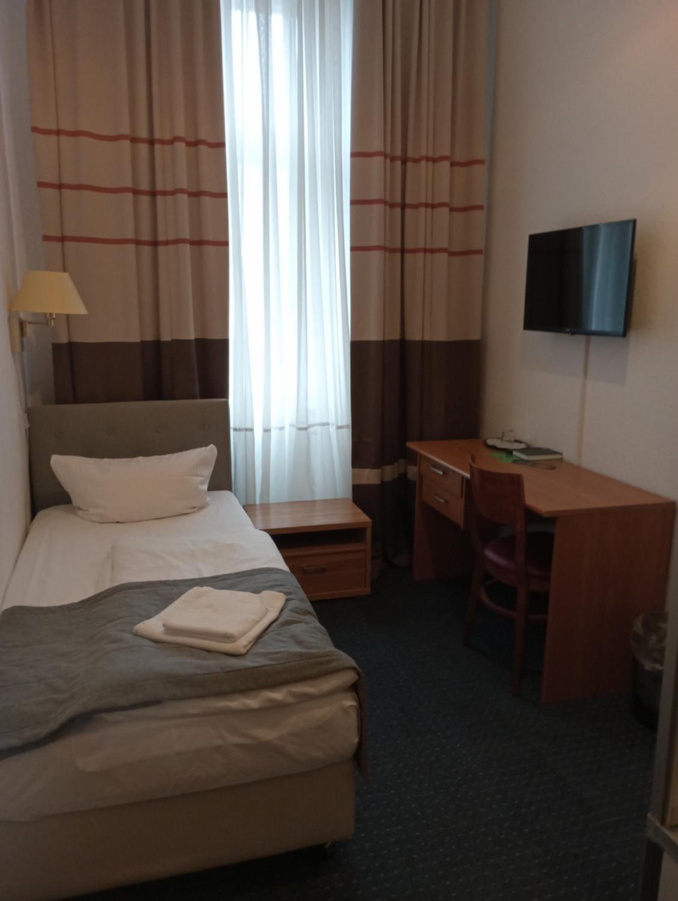 Single Room with Private Shower and Shared Toilet photo 1
