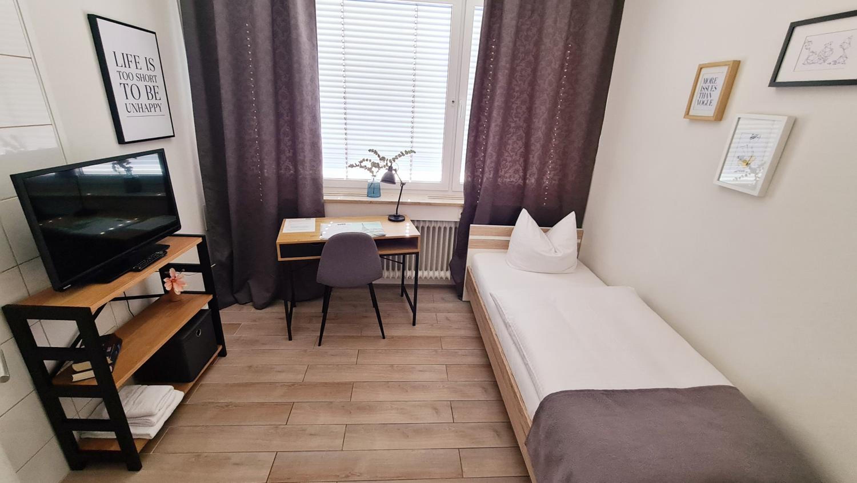 Single Room with Shared Bathroom