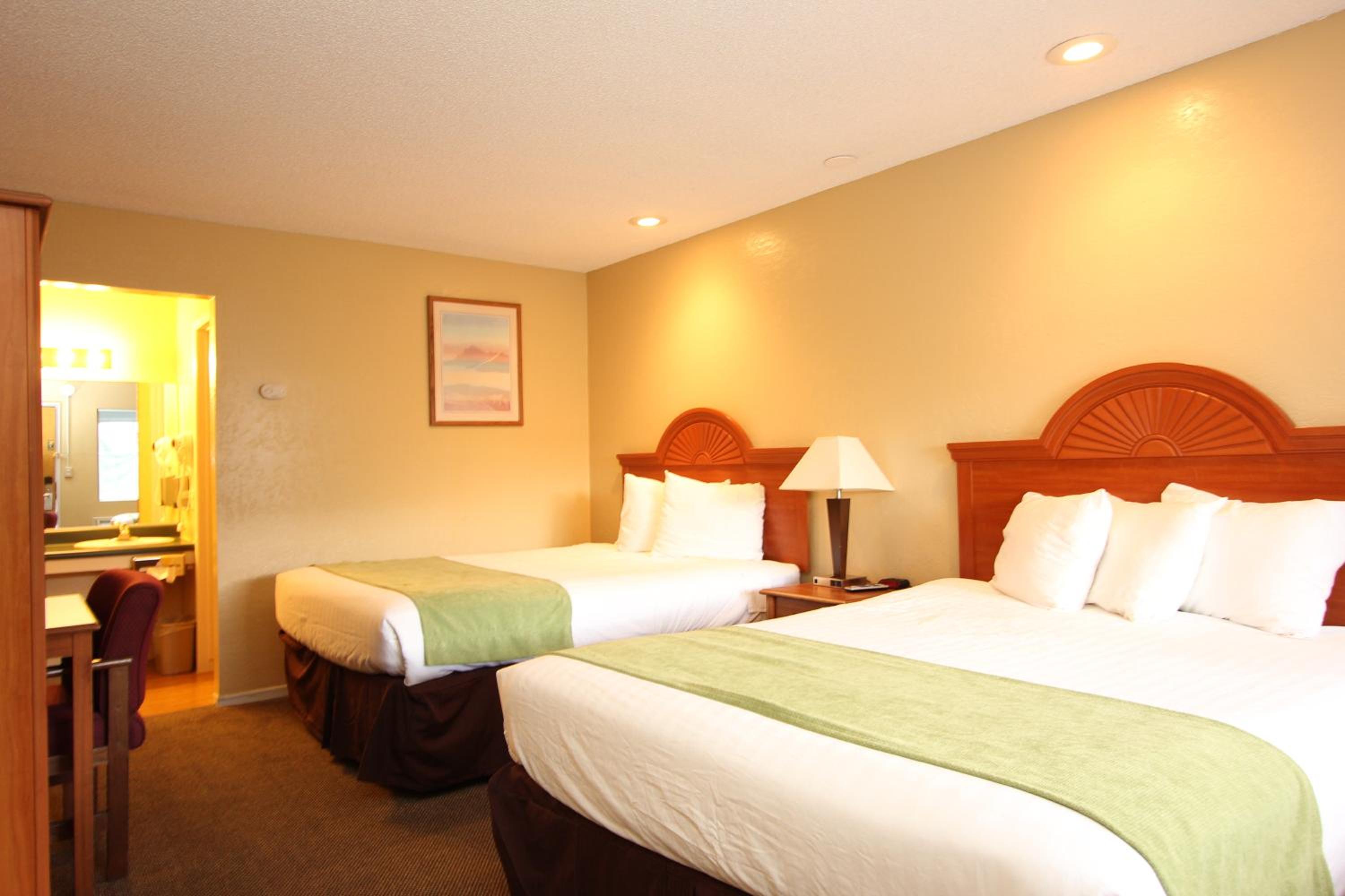 Queen Room with Two Queen Beds - Photo 1