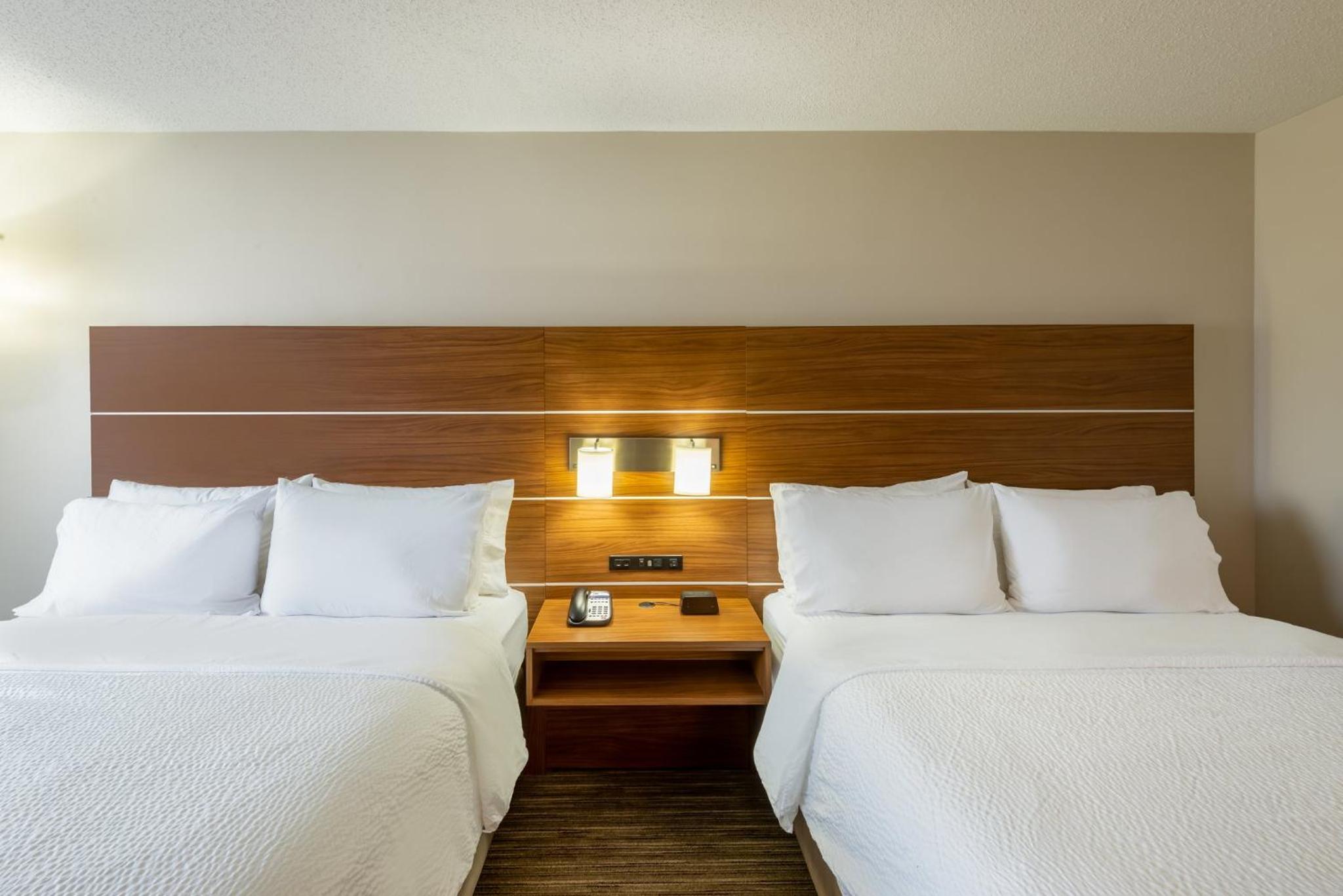 Standard Queen Room with Two Queen Beds - Photo 1