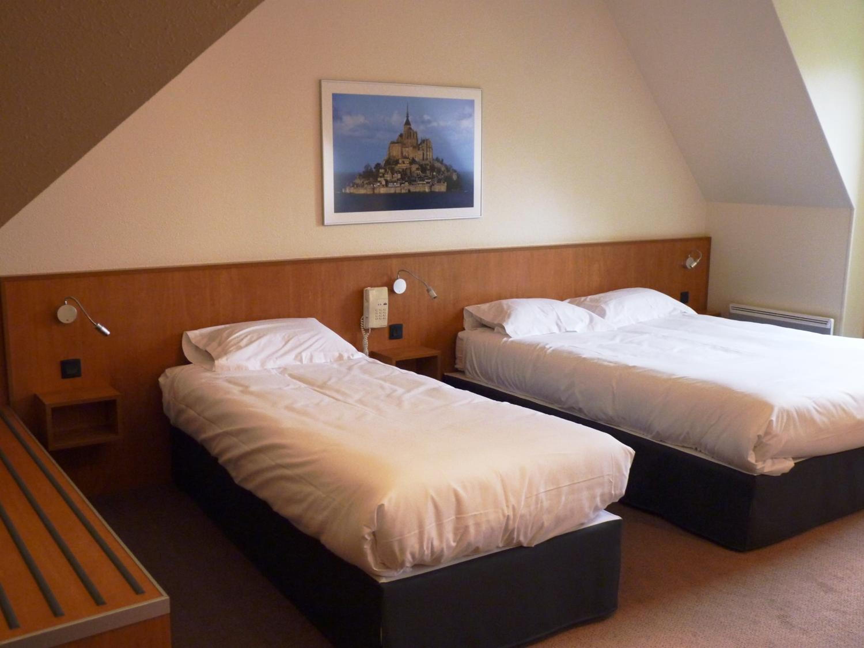 Triple Room (1 Double Bed + 1 Single Bed)
