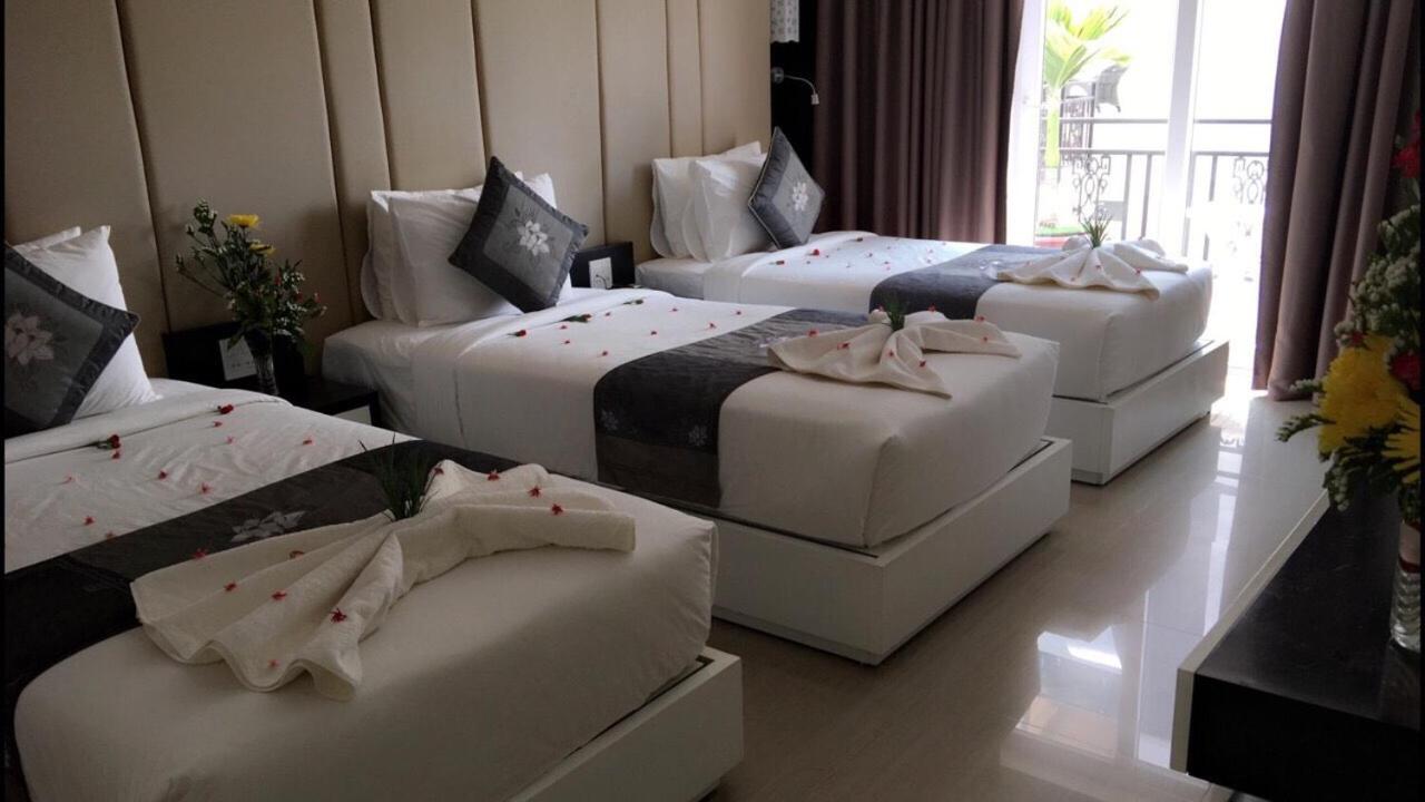 Deluxe Triple Room - Photo 6