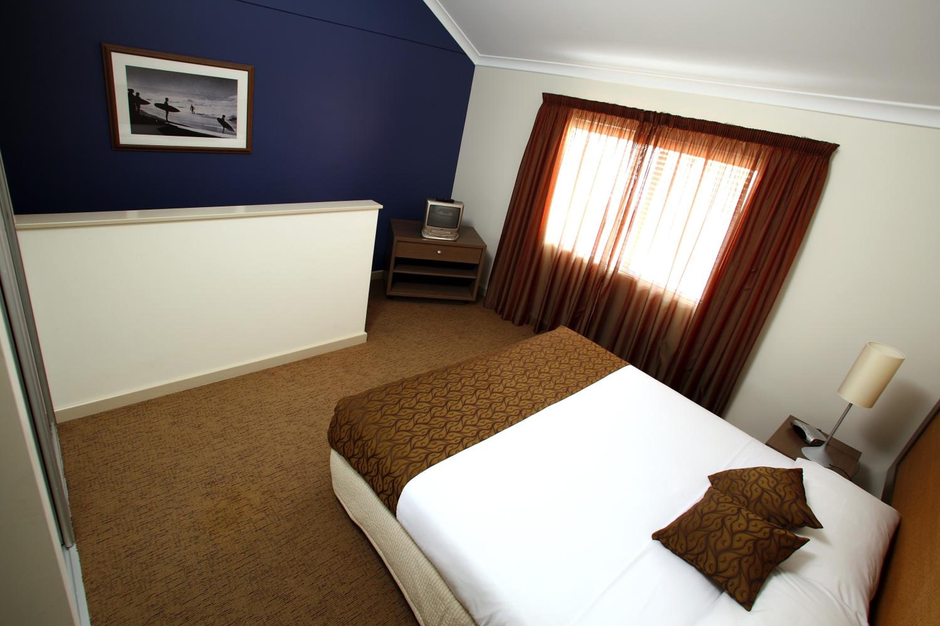 Three-Bedroom Apartment - Photo 2