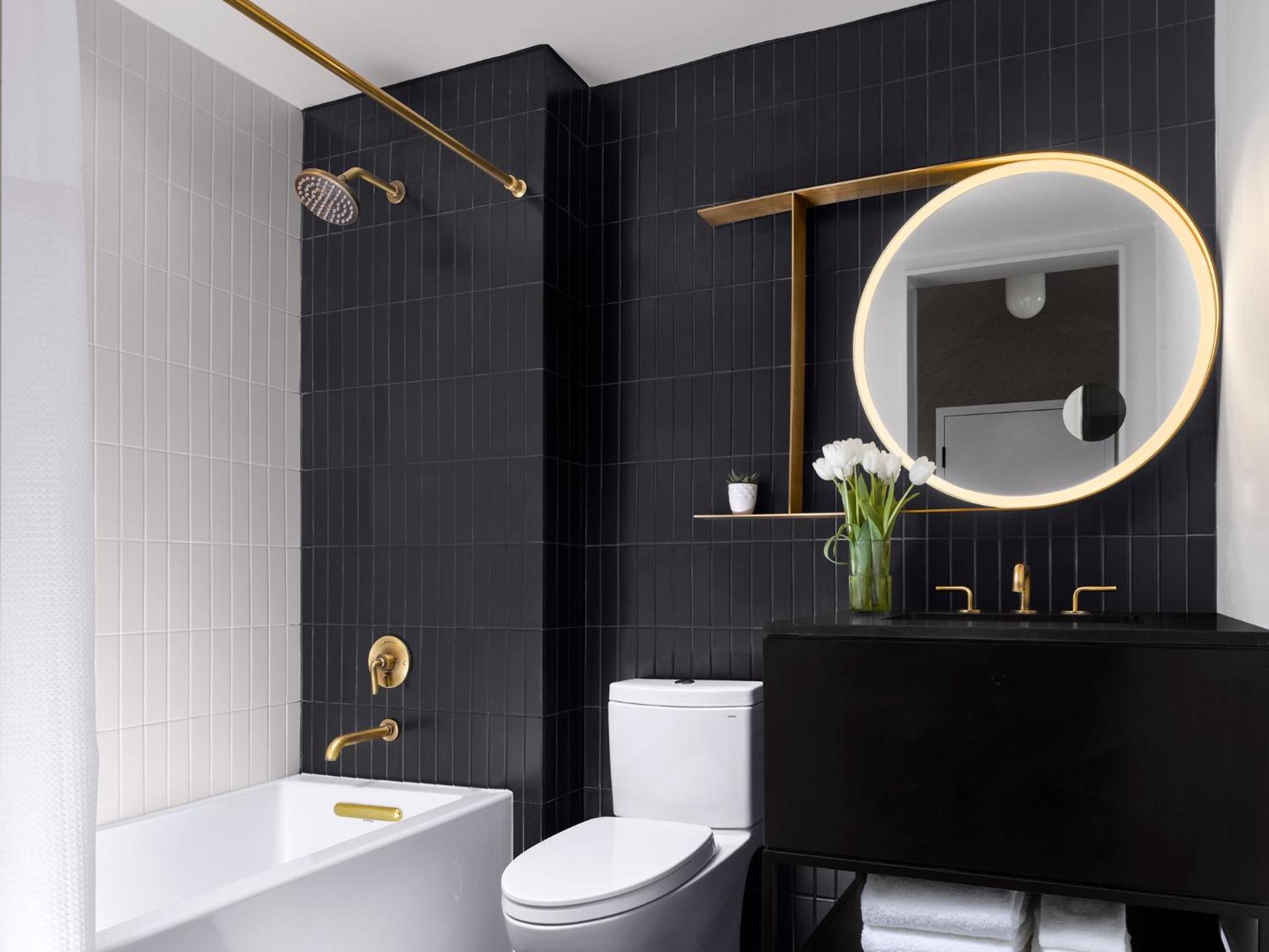 Experience luxury in our stylish and modern bathroom oasis.