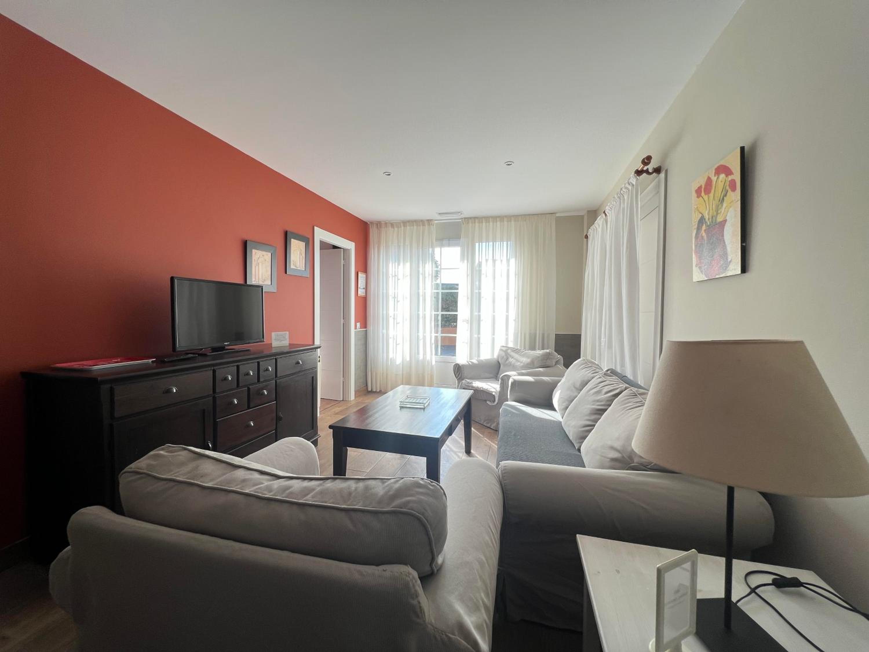 Three-Bedroom Apartment photo 2