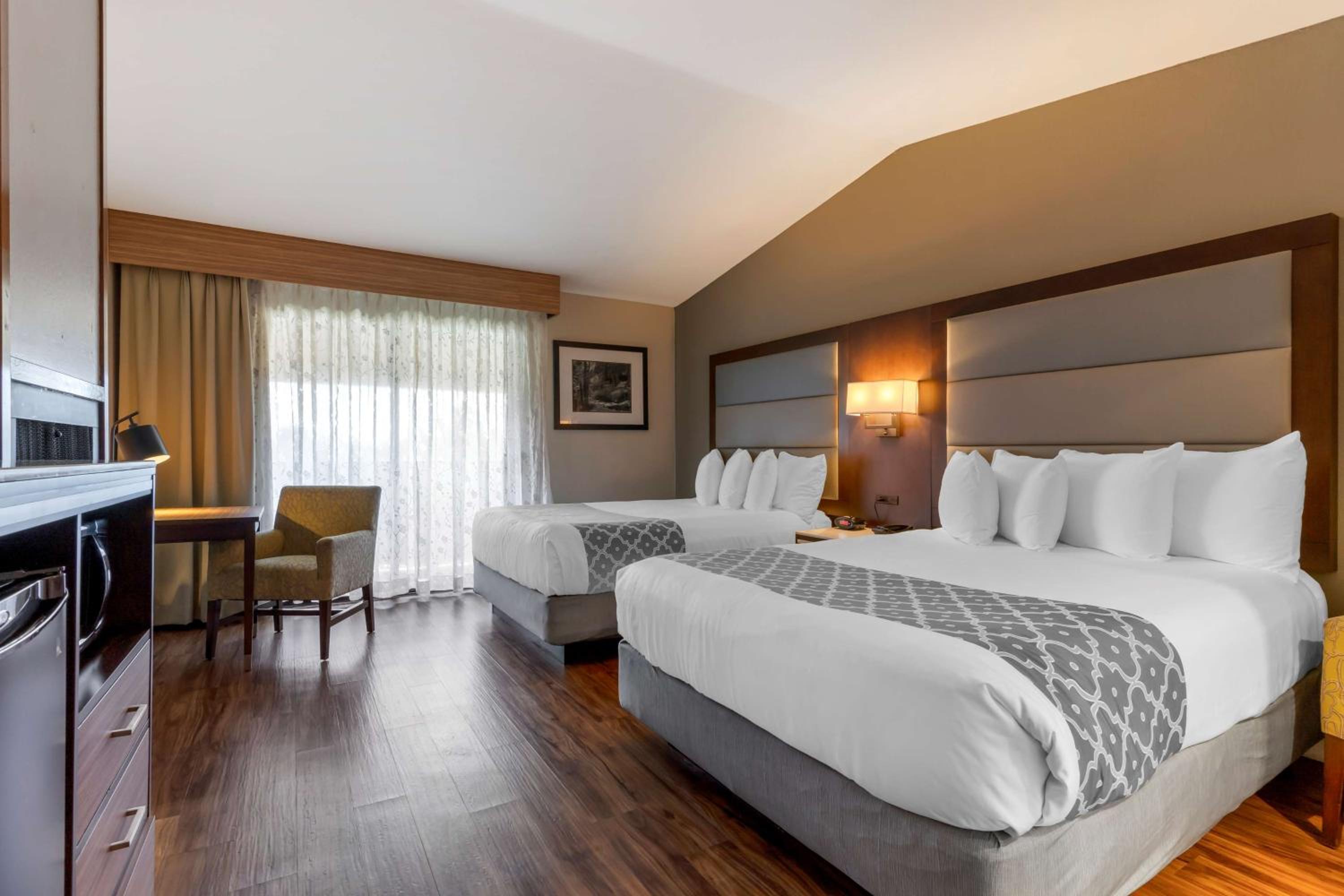 Queen Room with Two Queen Beds and Fireplace - Photo 3