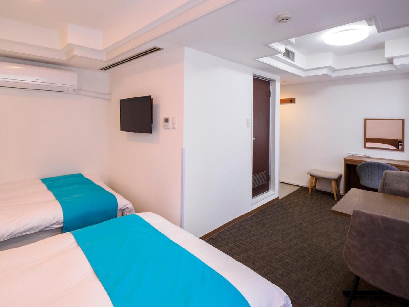 Economy Twin Room - Non-Smoking photo 2